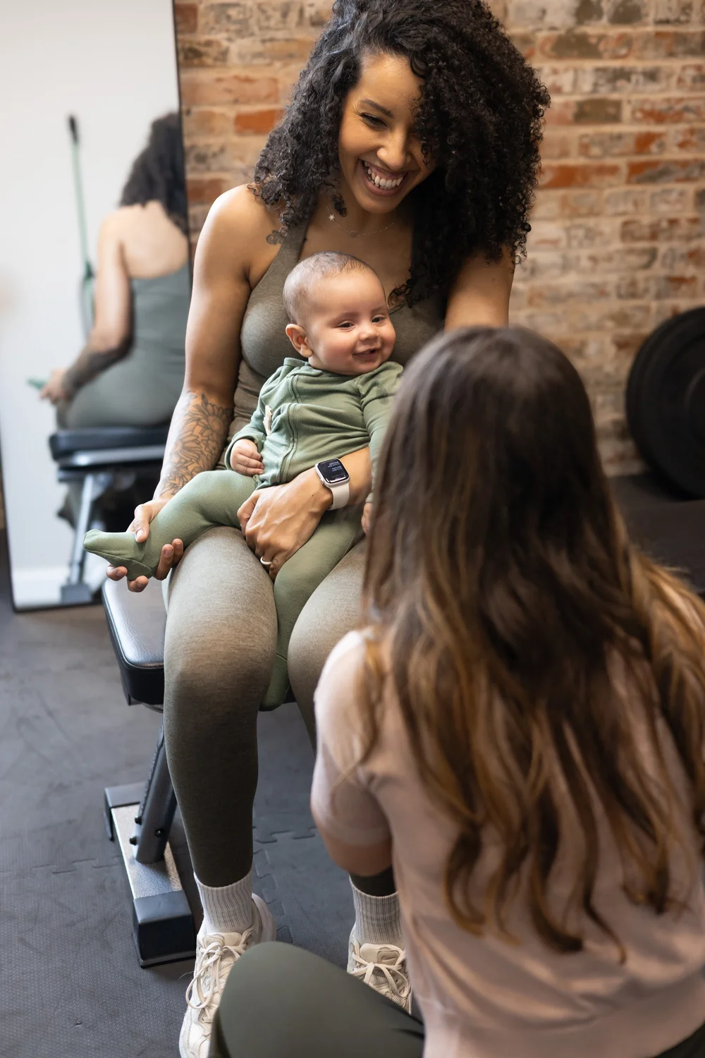 Therapist supporting a postpartum patient
