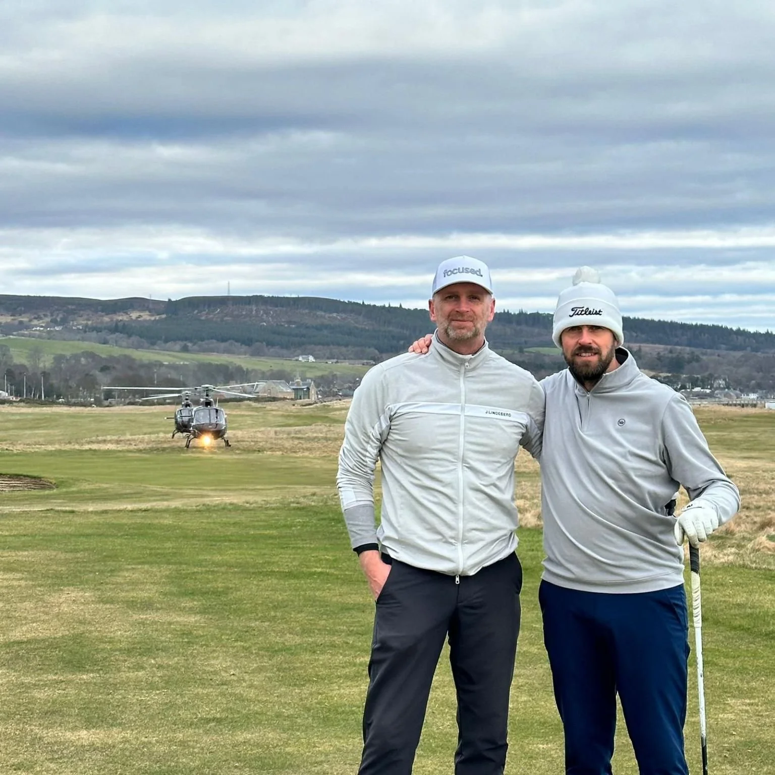 Alec Masson with golfer on links course — Focused Sport performance coaching