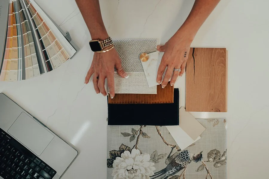 Interior design materials and fabric samples used to compare service options in Phoenix