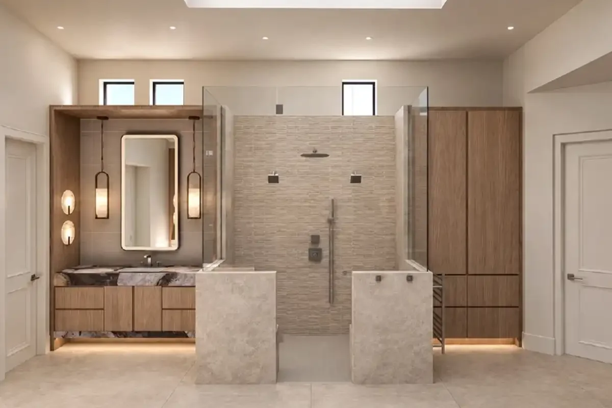 Scottsdale primary bathroom with walk-in shower, coordinated tile, glass panels, vanity, and cabinetry.