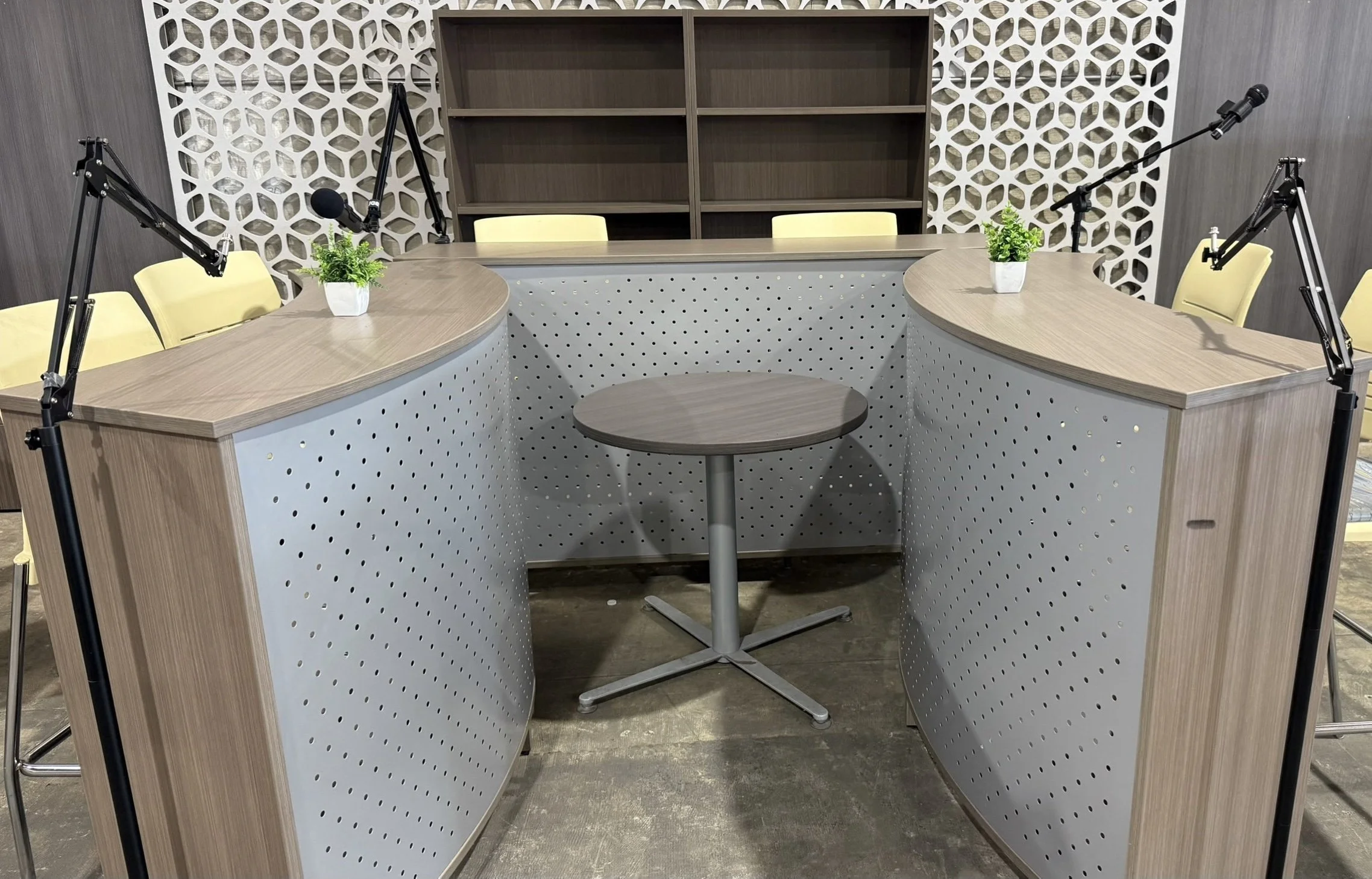 Curved specialty workstation and task seating in a recording environment