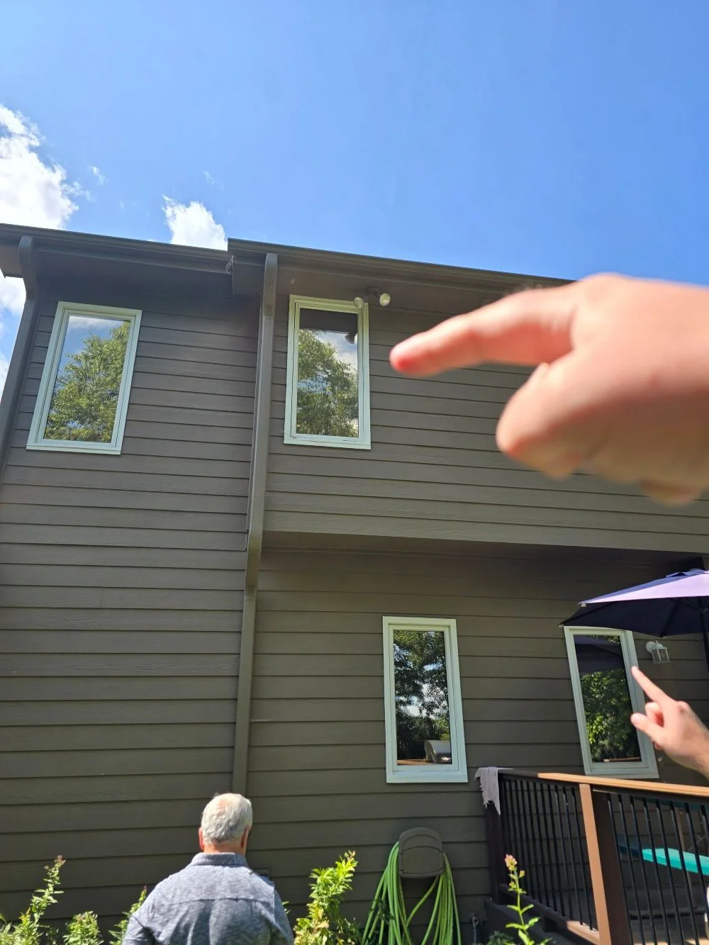 Siding inspection and damage assessment on an Omaha home