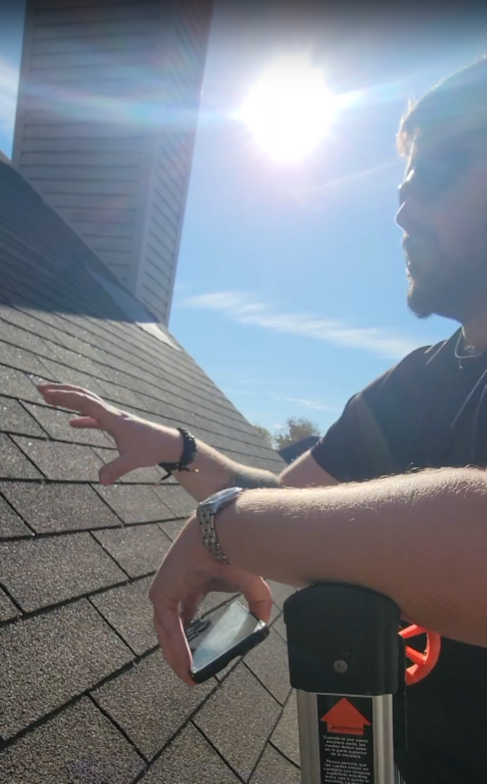 Noah Spagnotti inspecting a roof in Omaha