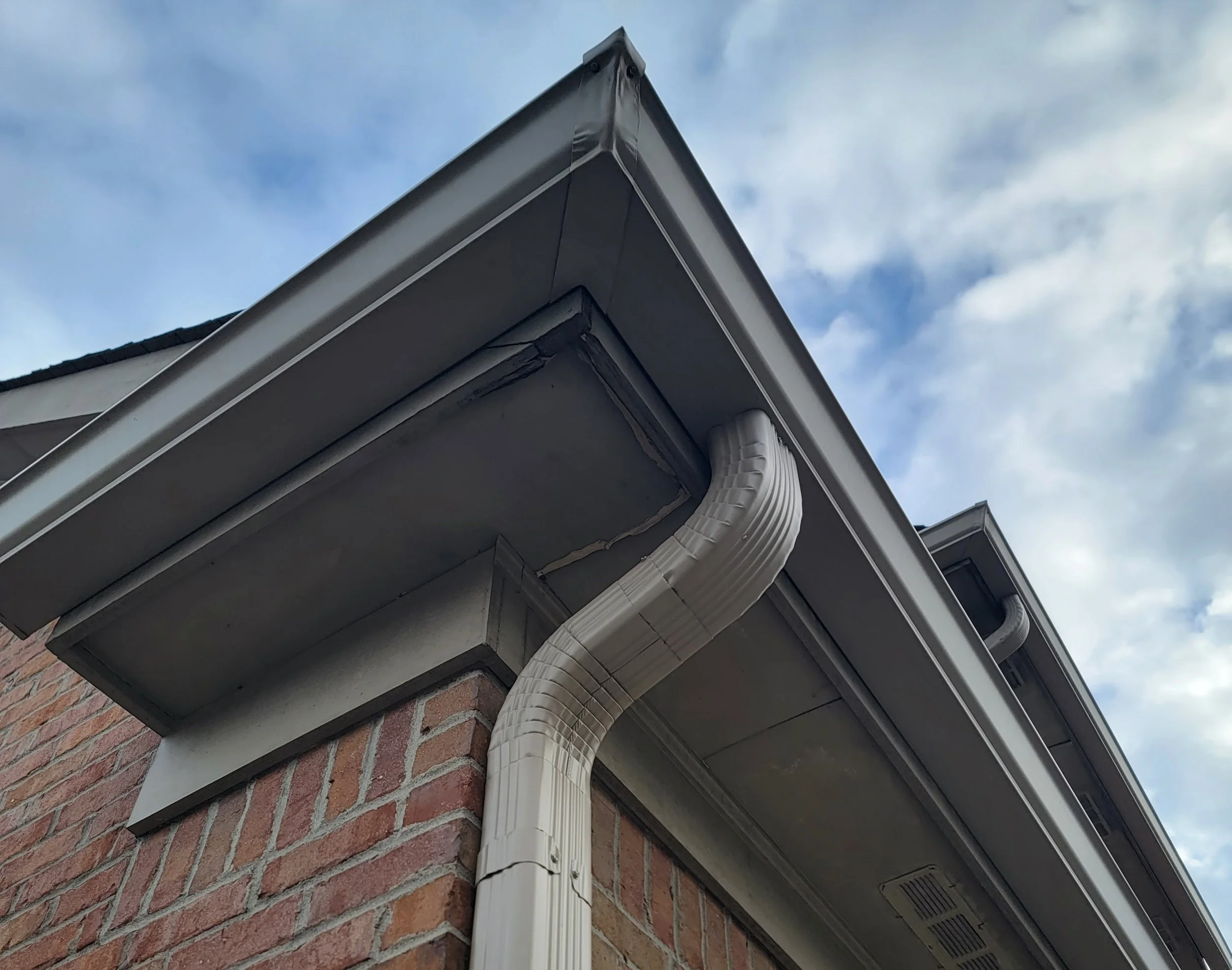 New seamless gutter replacement installed on Omaha home