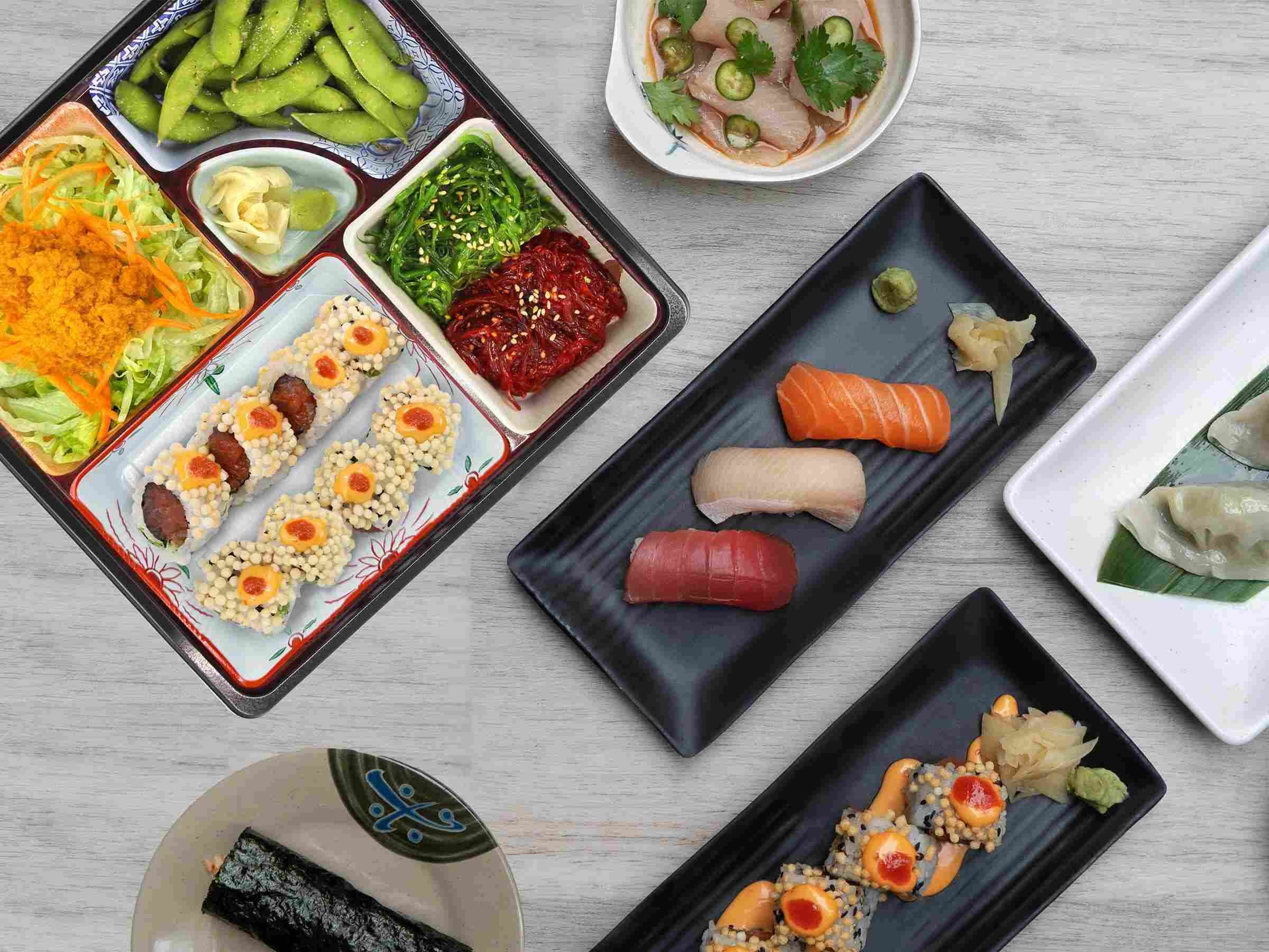 Assorted sushi rolls and bento boxes from Mr. Lim