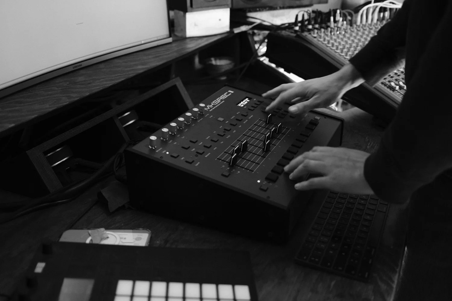Hands working at the mixing controller