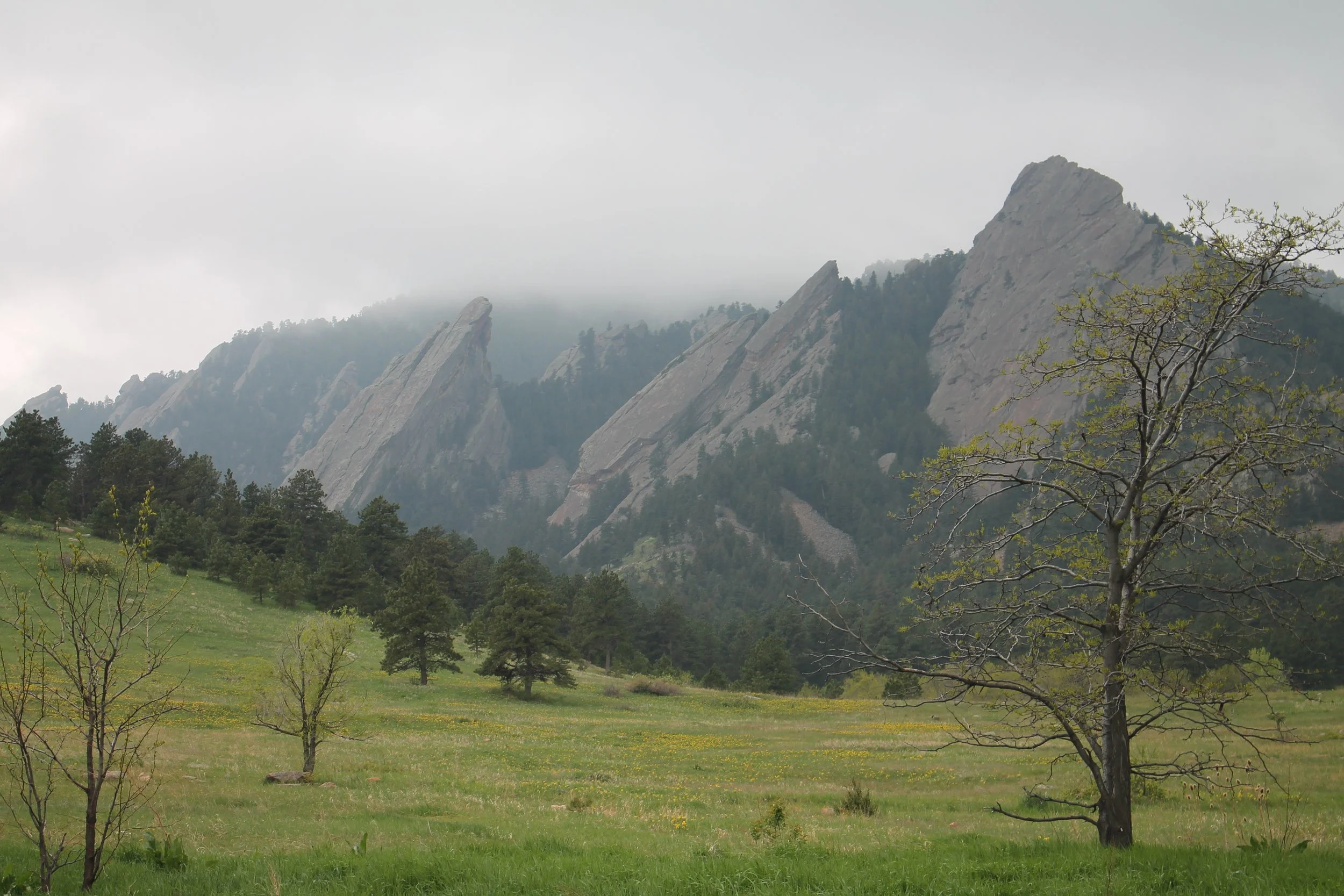 The Flatirons partly hidden by low cloud and changing mountain weather
