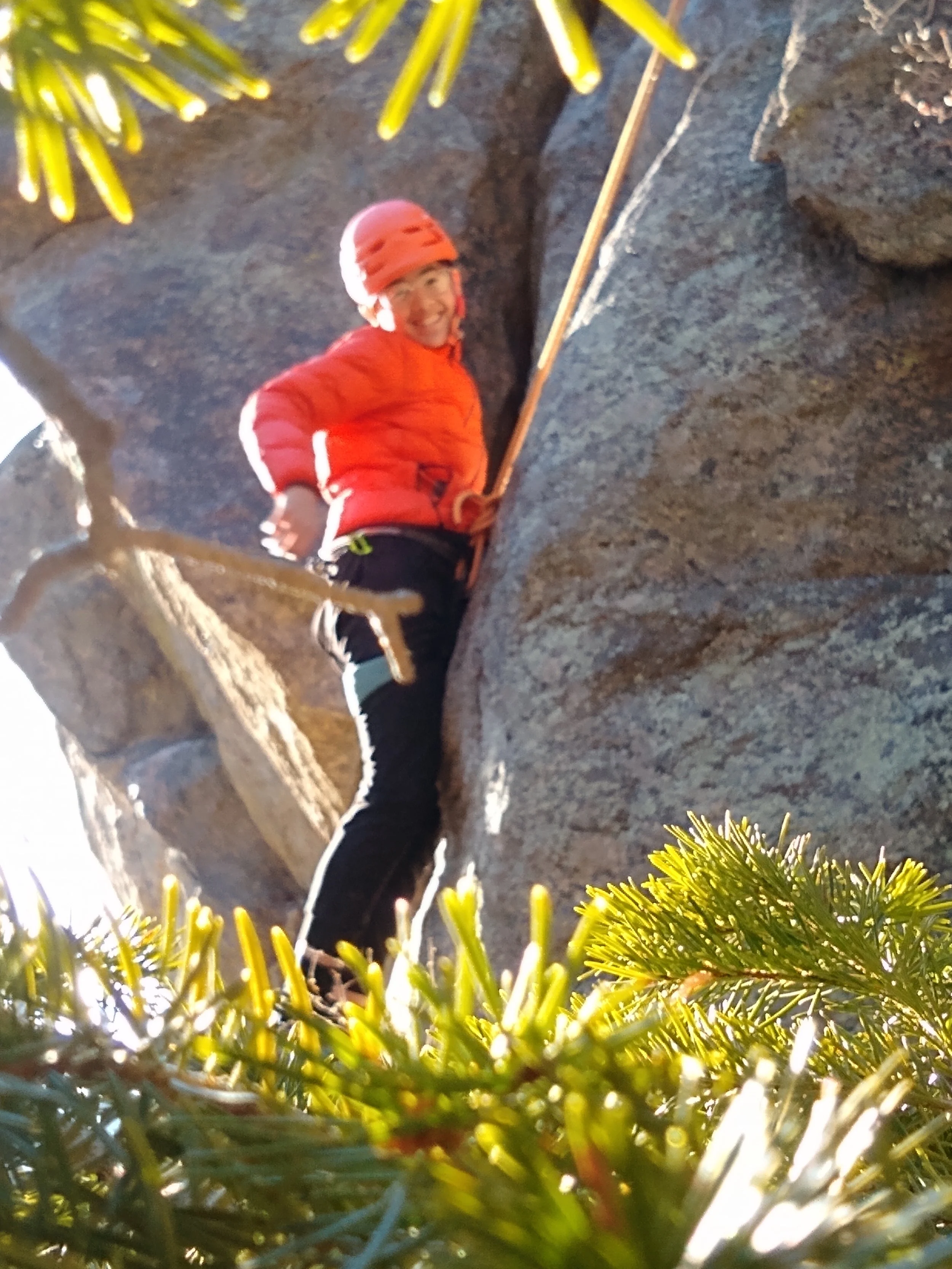 Winter climbing on sunlit rock near Boulder, Colorado