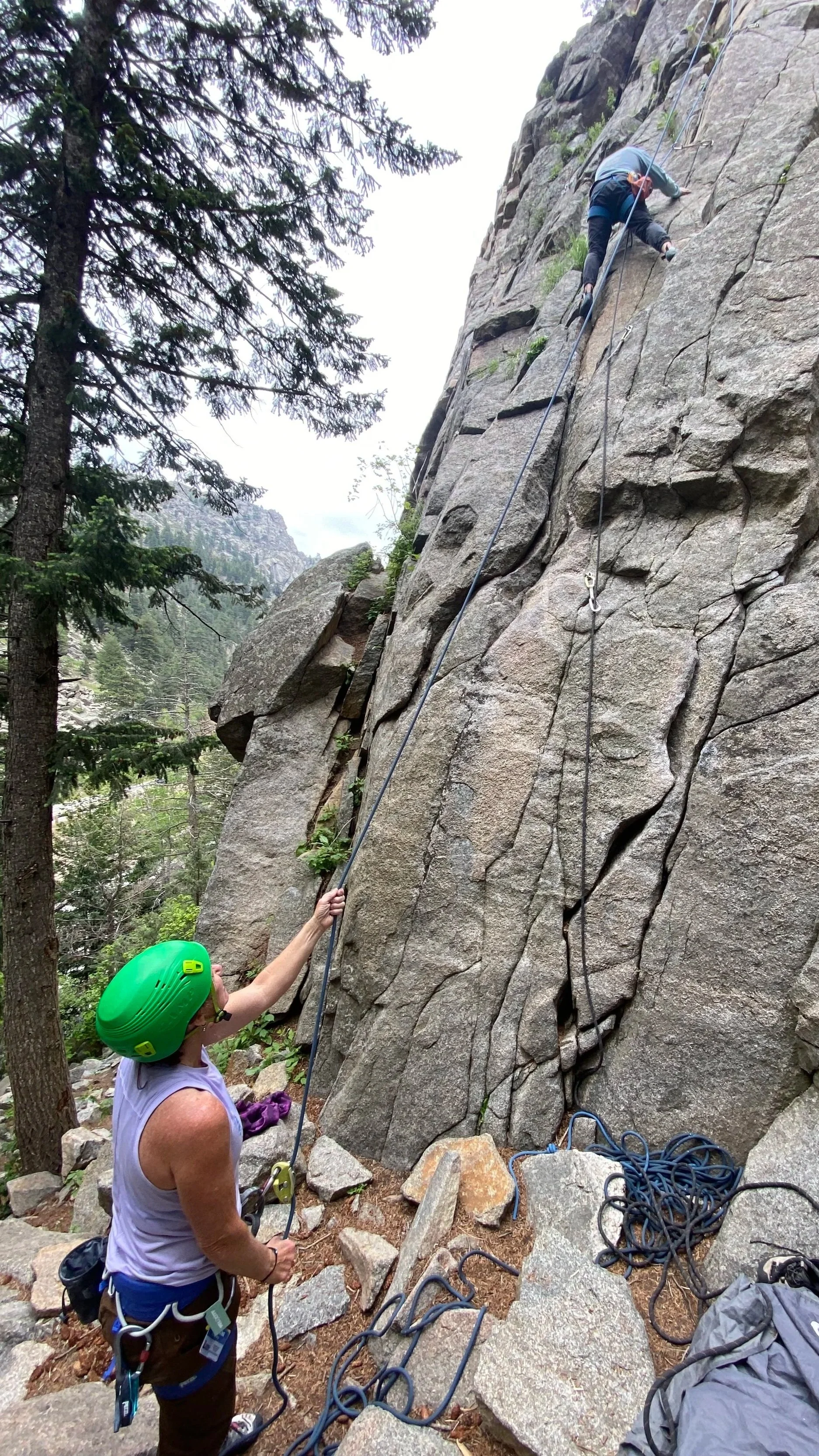Top-rope line and granite cracks at a Boulder Canyon crag