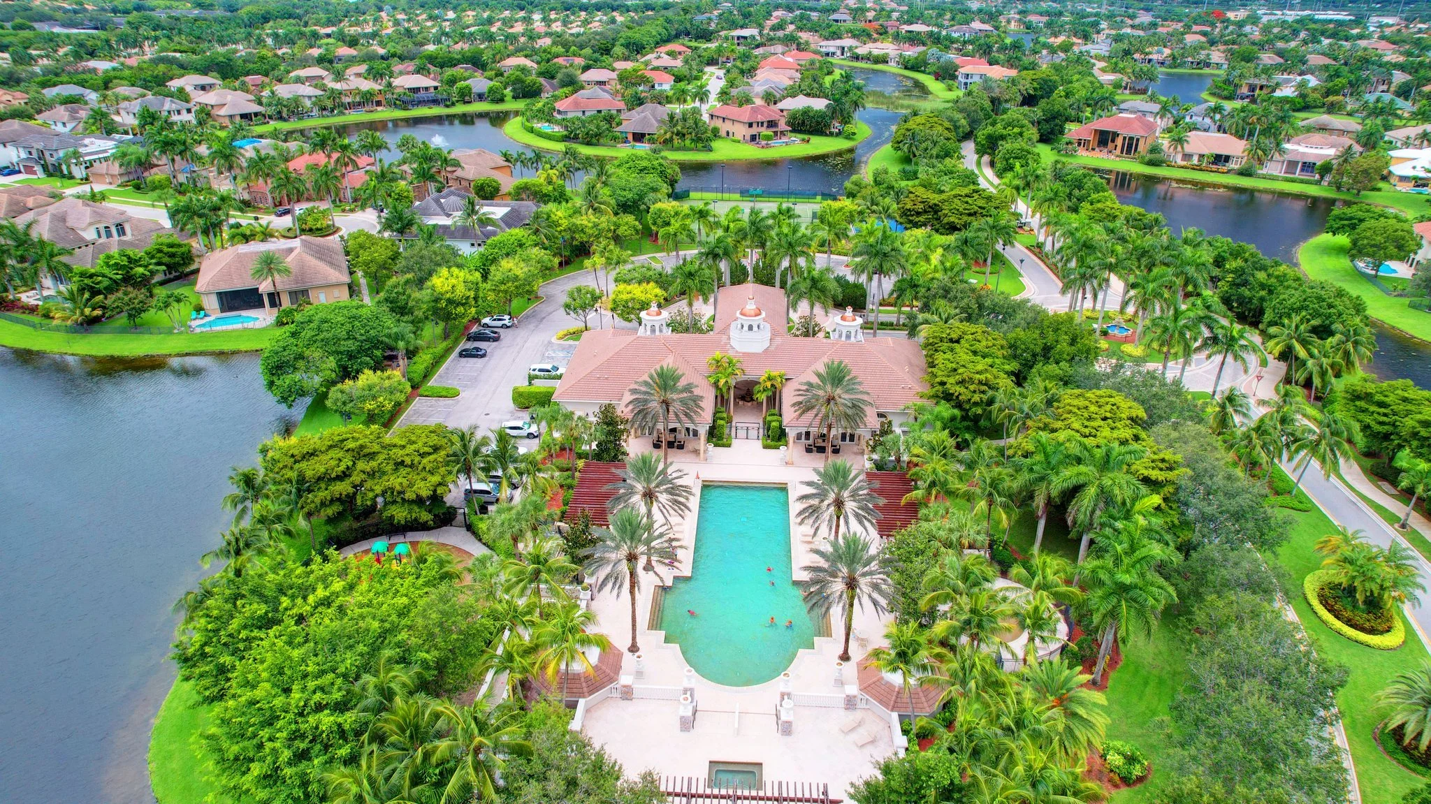 Versailles clubhouse and pool aerial view