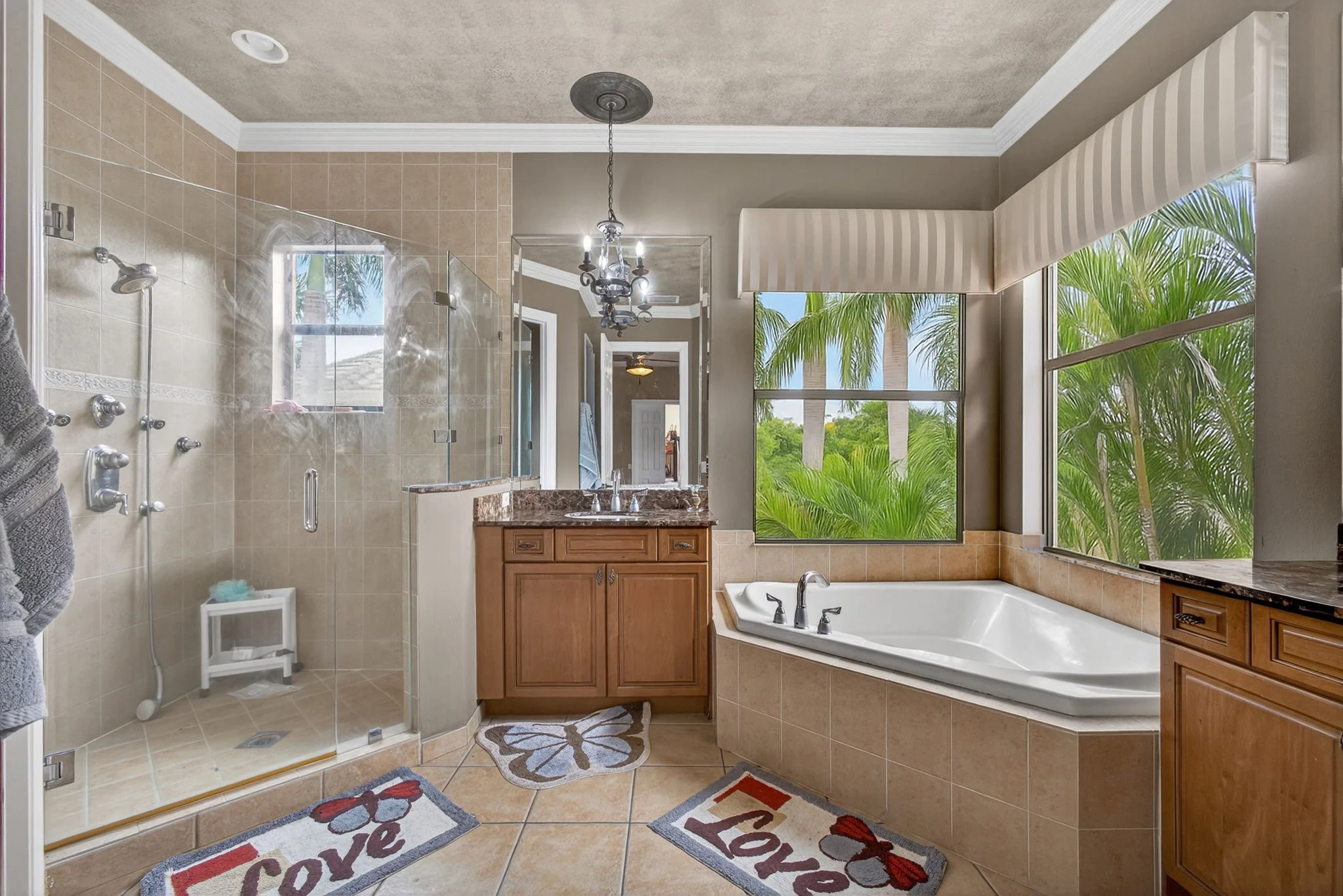 Primary bathroom — dual vanity and tub