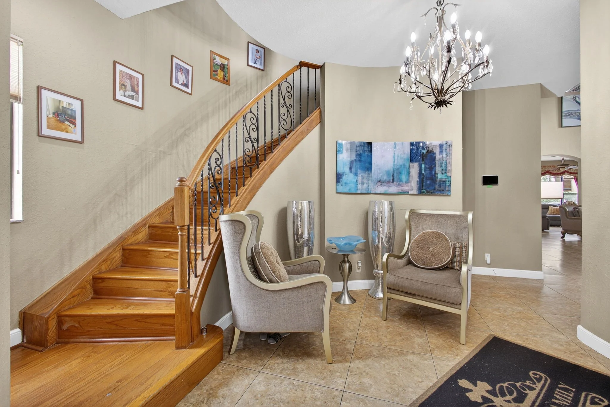 Foyer with curved staircase
