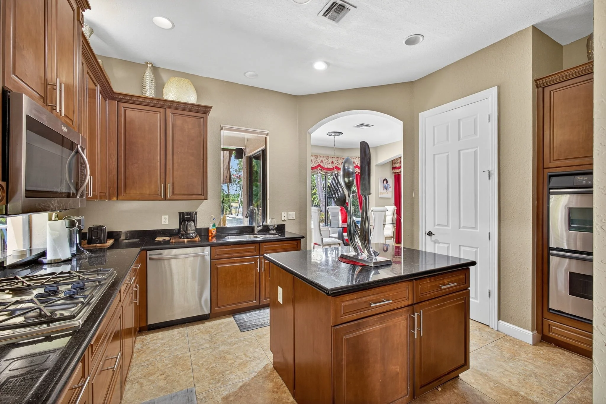 Kitchen with granite counters and stainless appliances