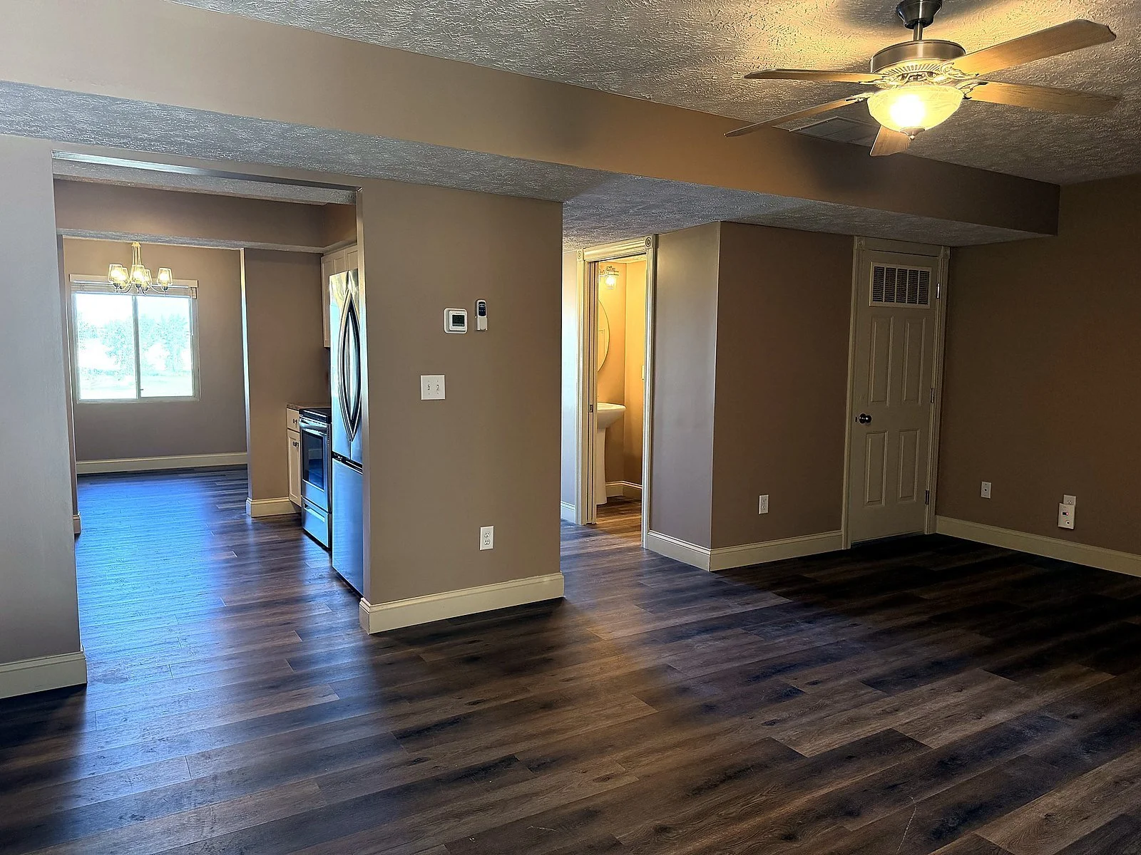 Open living and dining area in a two bedroom townhome