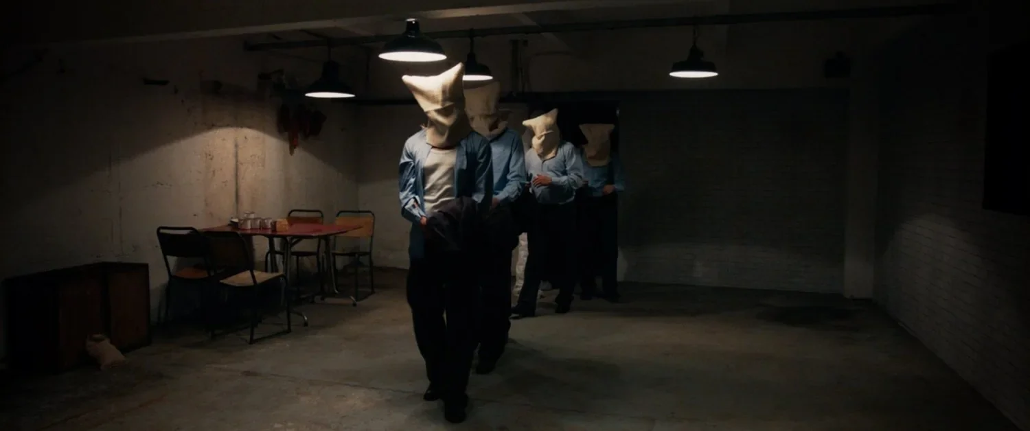 Prisoners inside the chamber in The Sleep Experiment