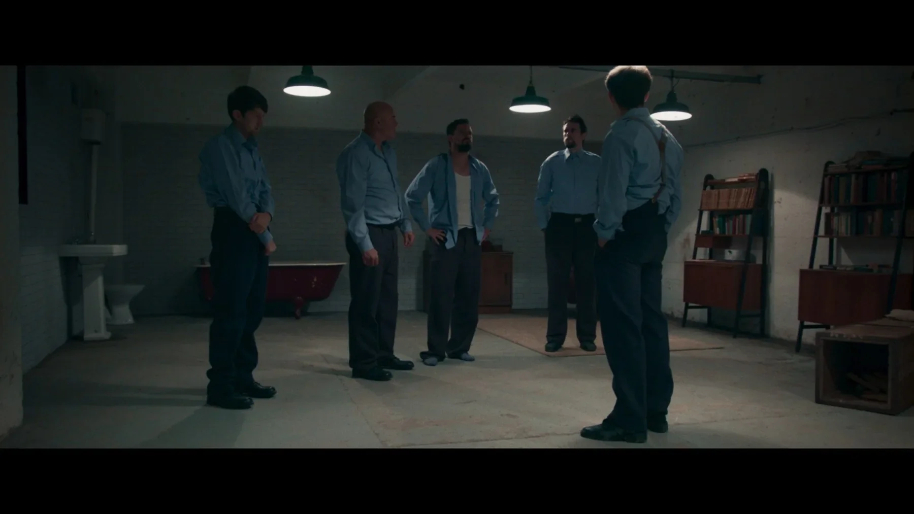The prisoners in their chamber in The Sleep Experiment.