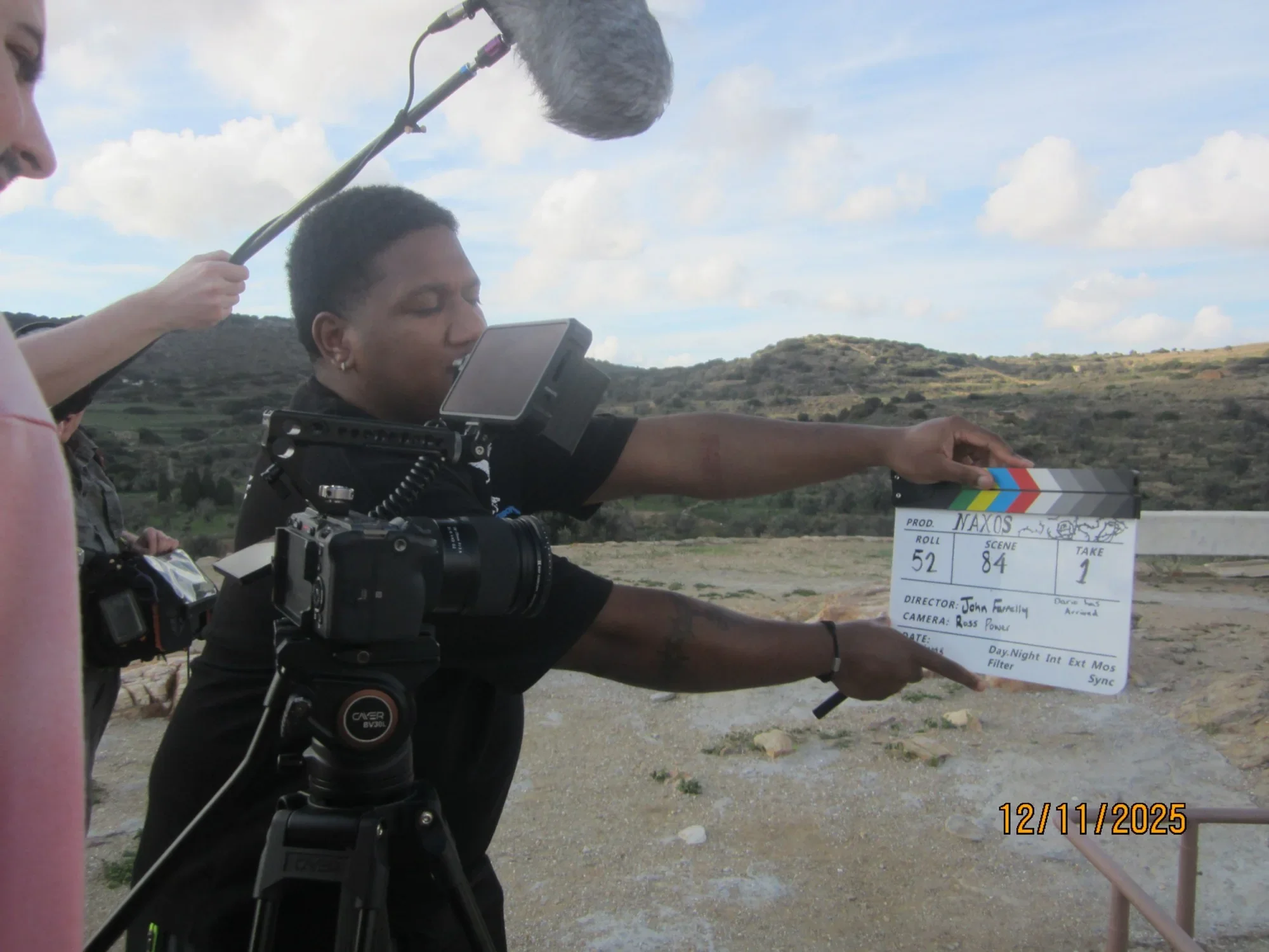 Camera, slate and sound on location.