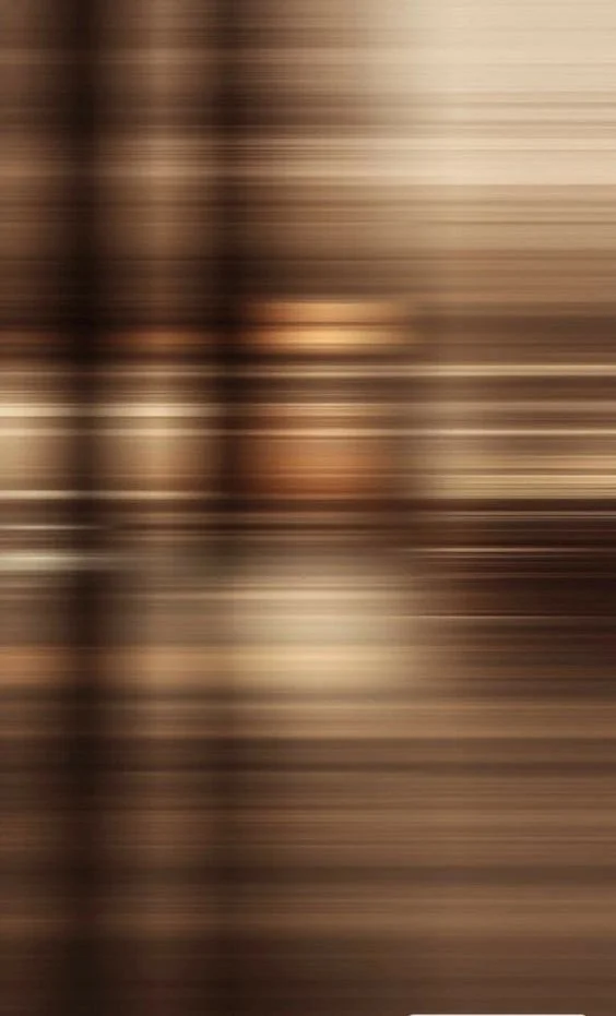 Streaks of warm copper and cream light, softly blurred, for BCLR's brand guardianship service