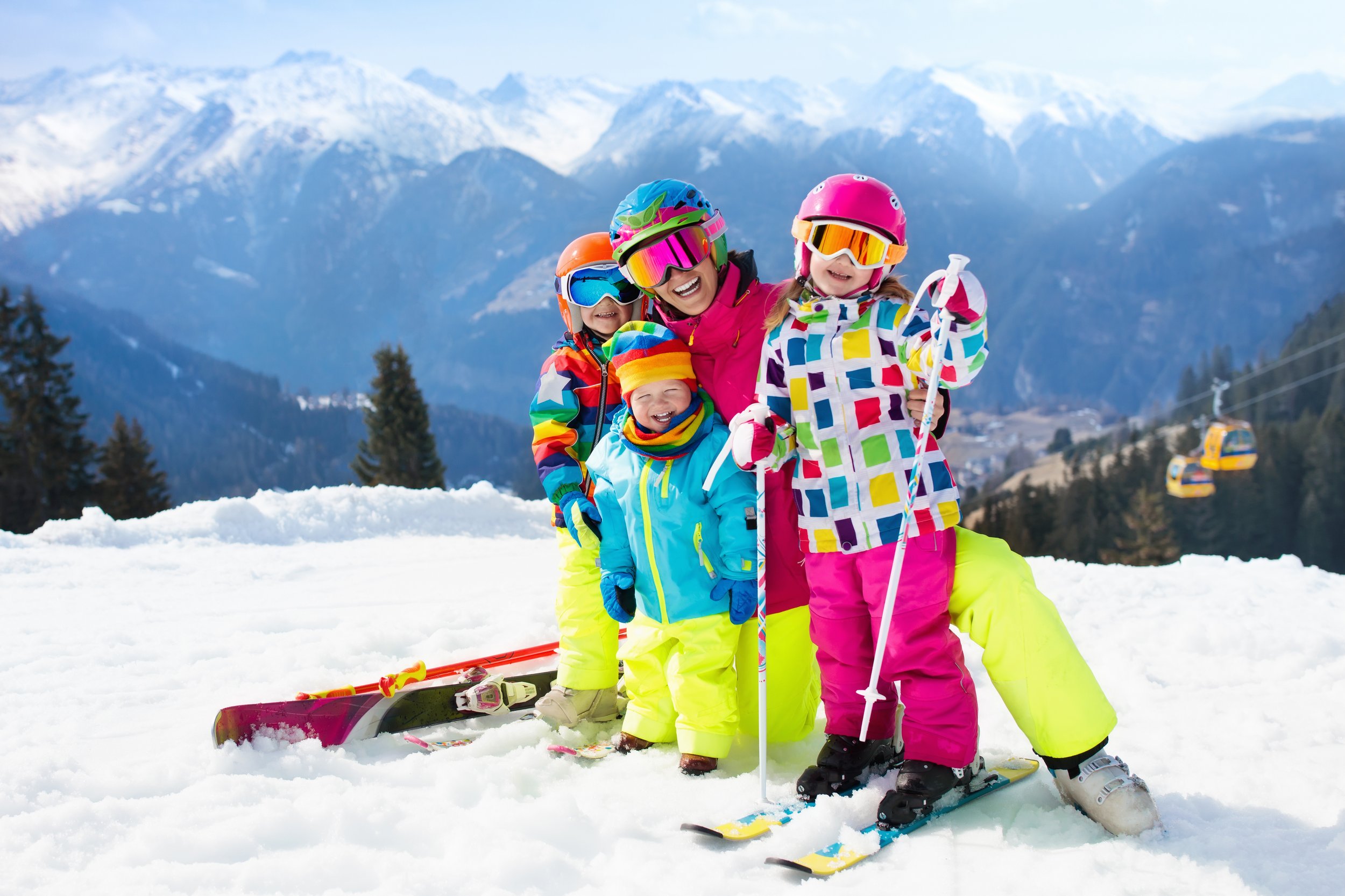 Family group enjoying an adaptive skiing outing