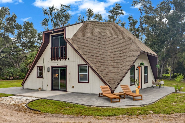Side exterior of a geodesic dome home