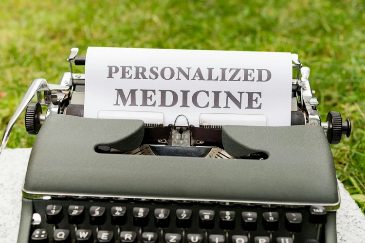 Typewriter with a paper saying 'Personalized Medicine'