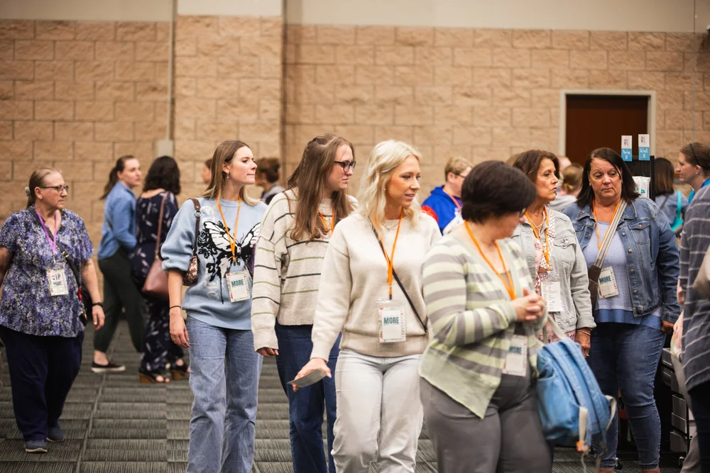 Guests connecting in the conference hall