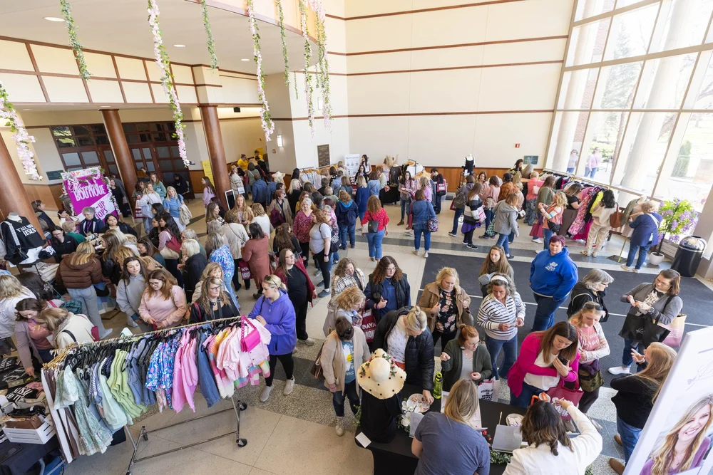 Guests shopping the Blooming Boutique at MORE 2025