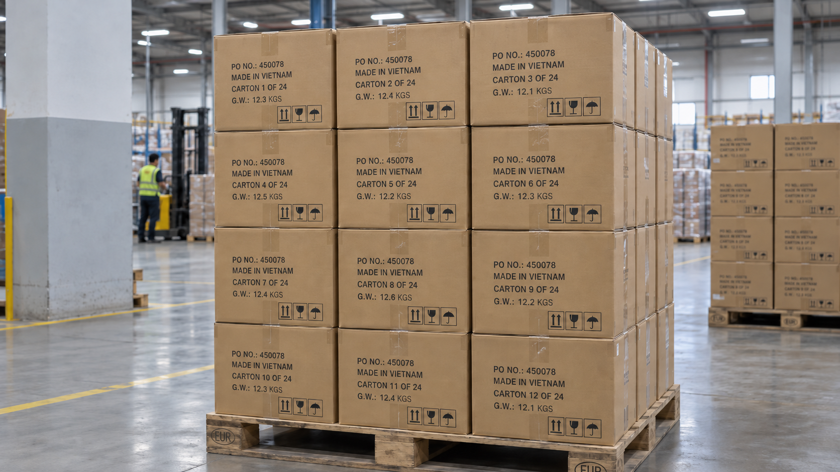 Stacked export cartons with printed shipping marks showing purchase order numbers, country of origin, and carton numbers in an apparel warehouse