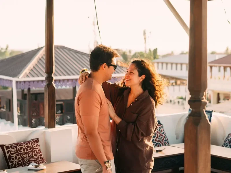 Couple celebrating a special occasion on a luxury beach holiday