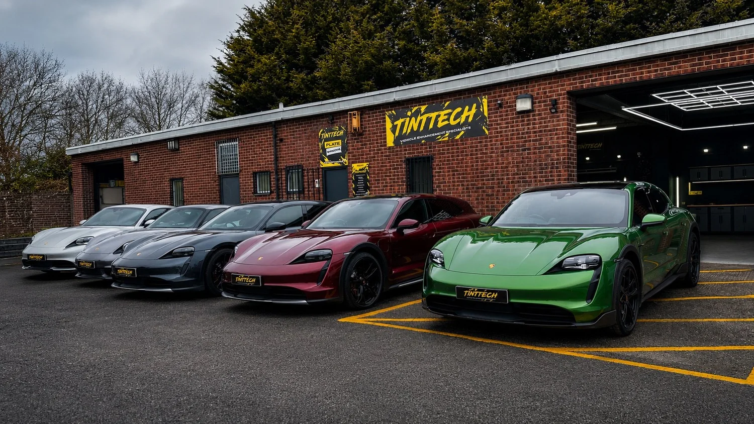 Porsche Taycans lined up outside the TintTech Nottingham unit
