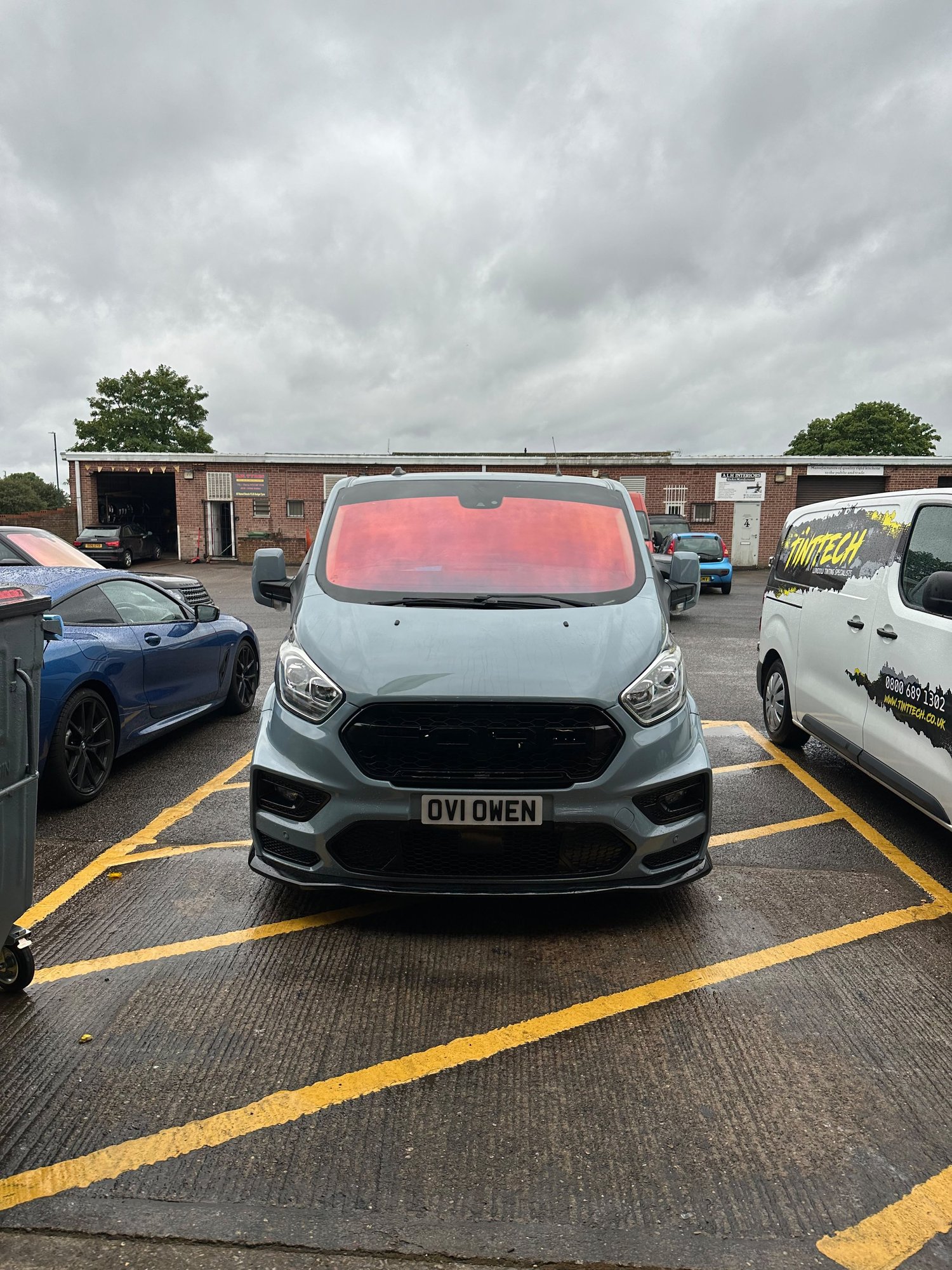 Ford Transit Custom van with a colour-shifting red chameleon windscreen, fitted by TintTech Nottingham