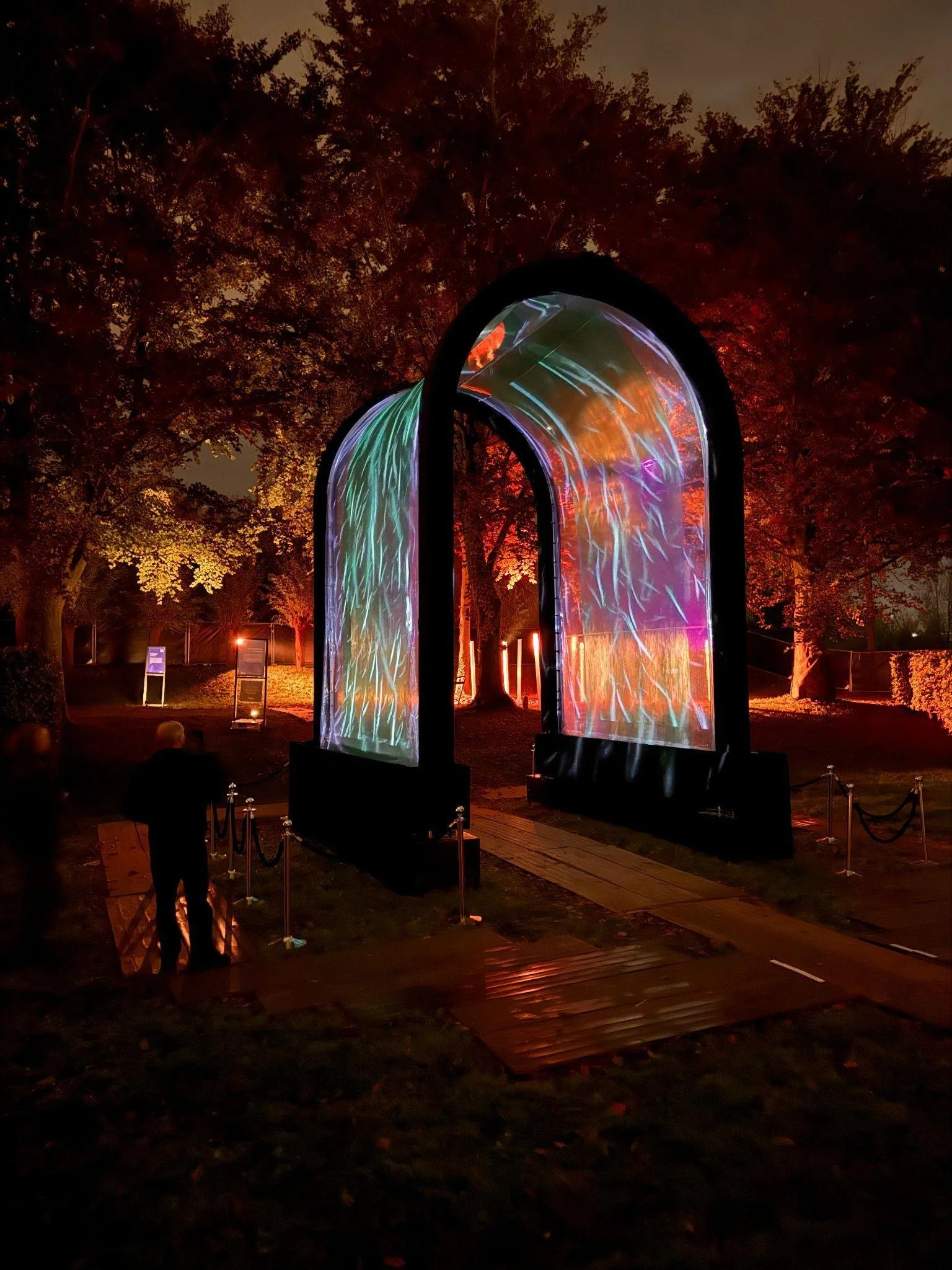 Watergate 2024 illuminated in a park at night