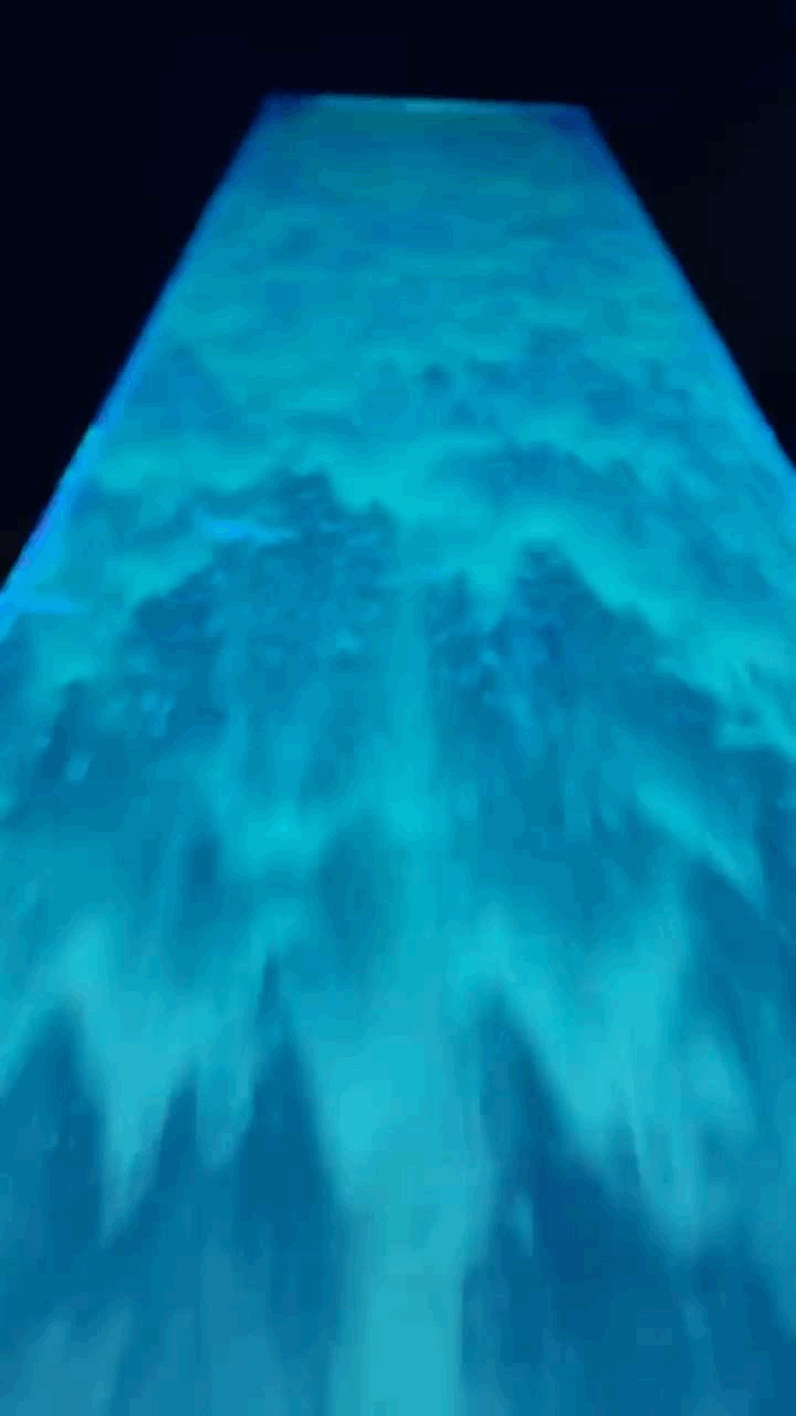 Bioluminescent Waterjets 2025 — moving water detail