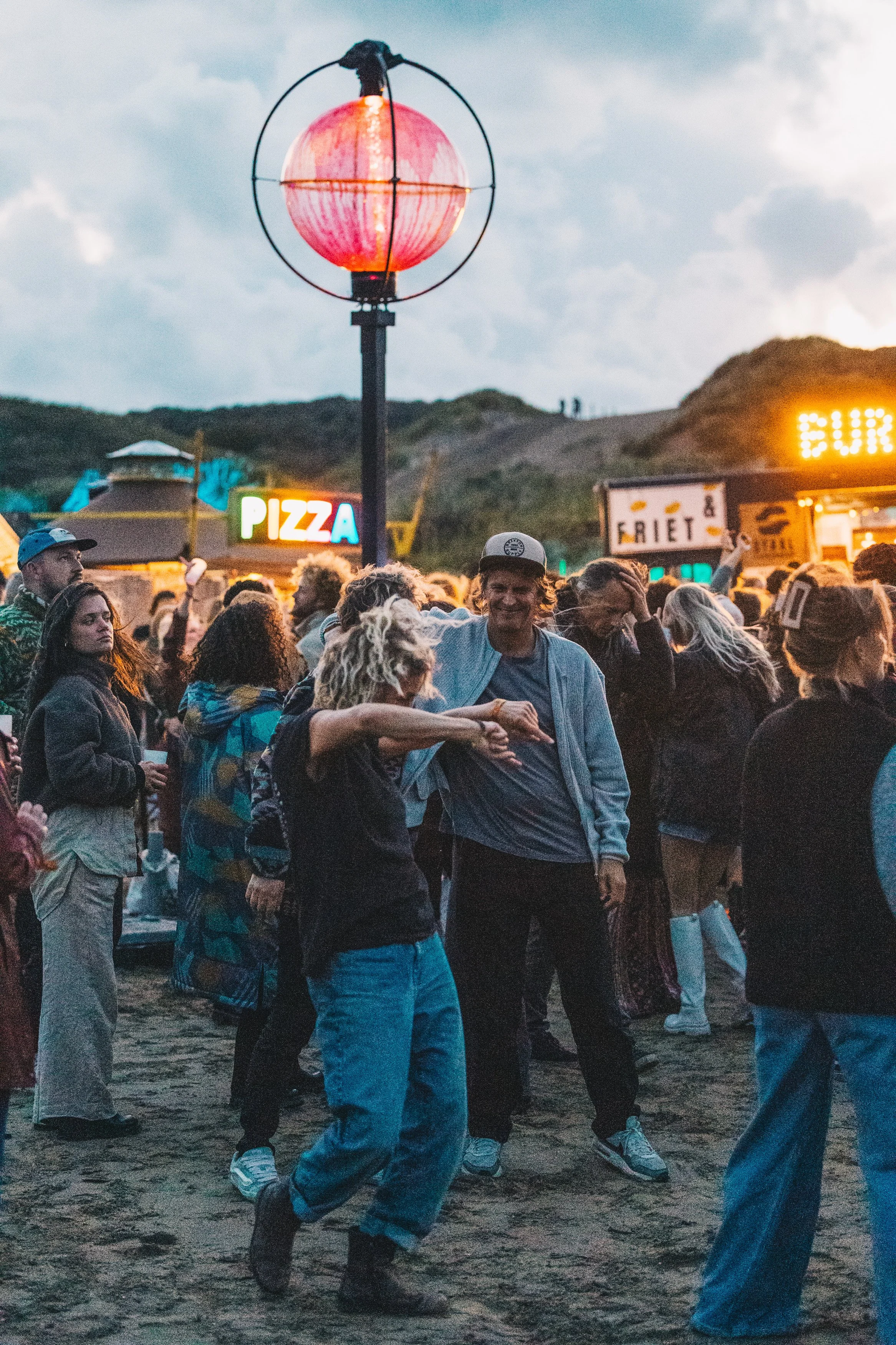 Surfana 2025 — illuminated sphere among the audience