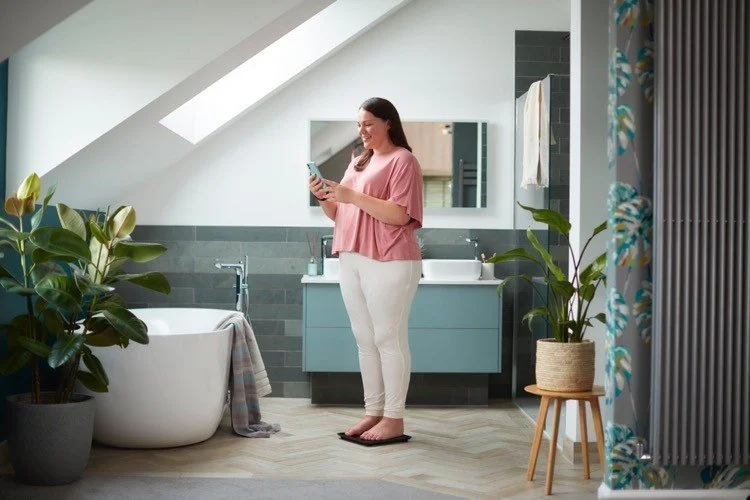 Person checking their phone while living an active lifestyle