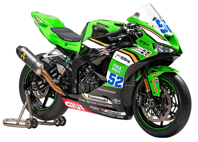 Number 52 Kawasaki ZX-6R race bike on a paddock stand