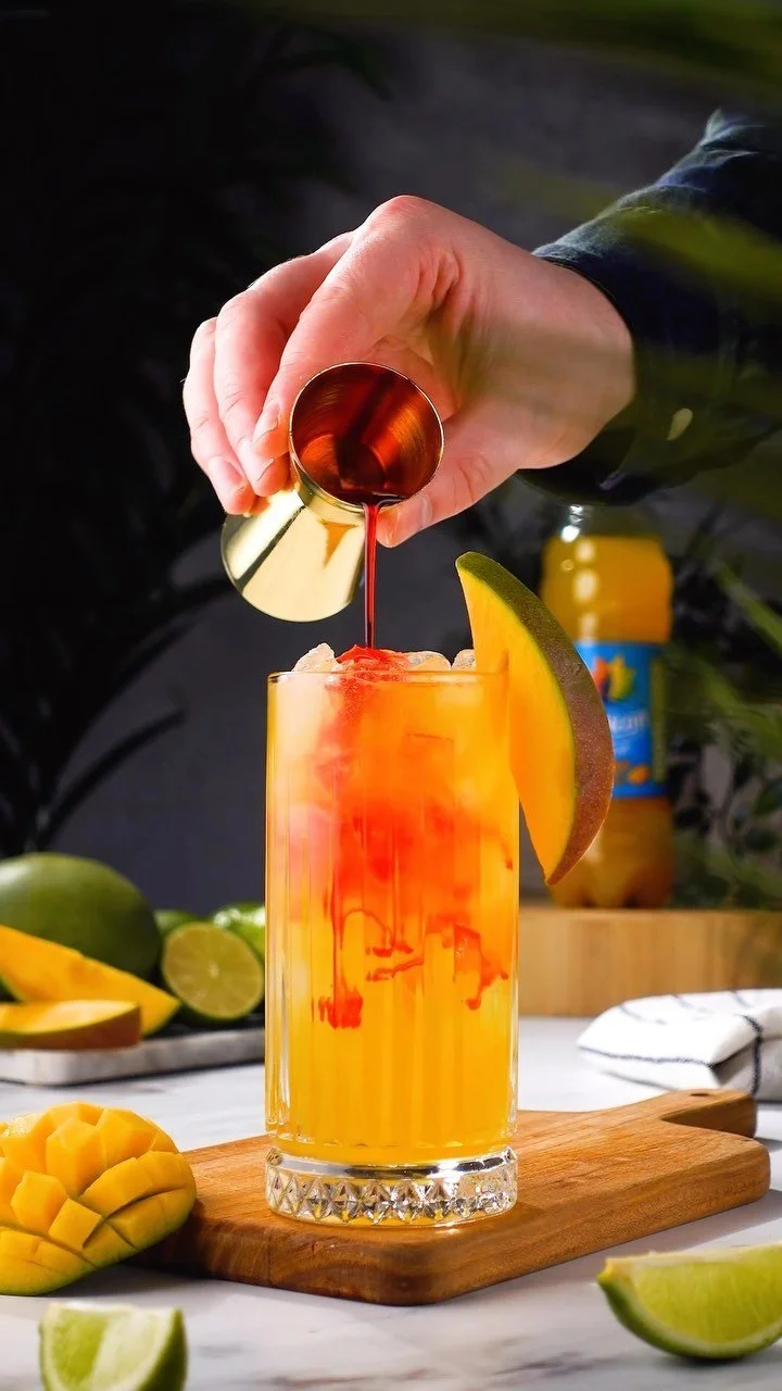 Mango Punch Some recent work that I have cocktail recipe by Gin & Domic