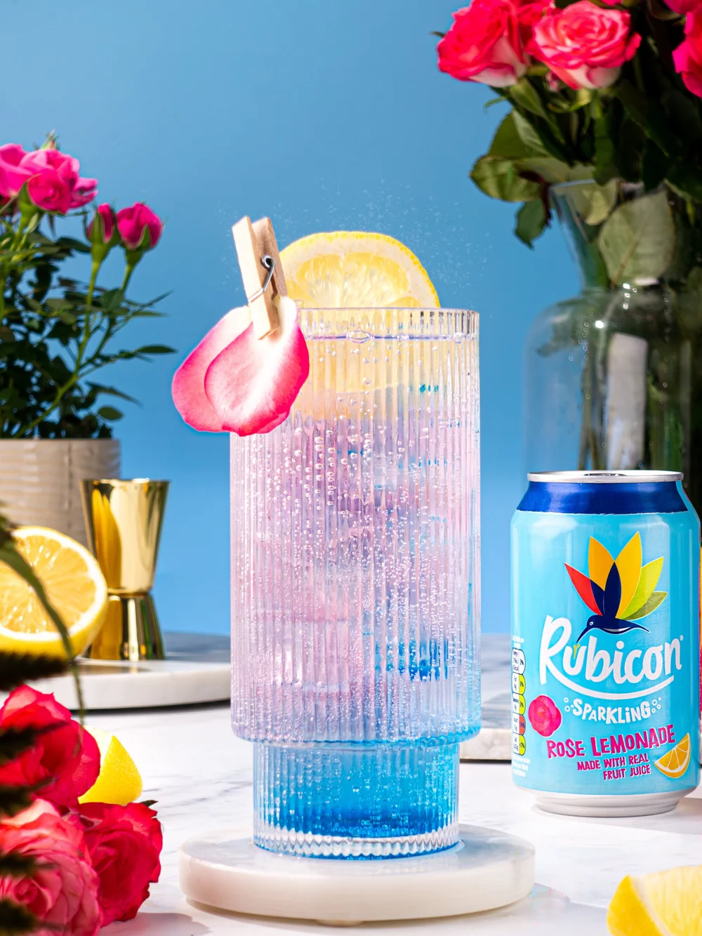 Rubicon lilac cocktail with jigger pour