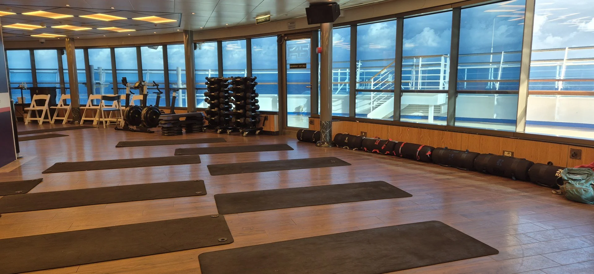 Floor mats arranged in an ocean-view room.