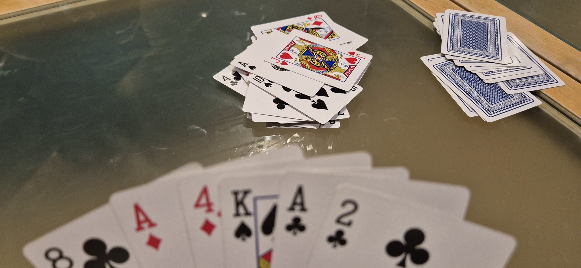 Playing cards arranged on a table.