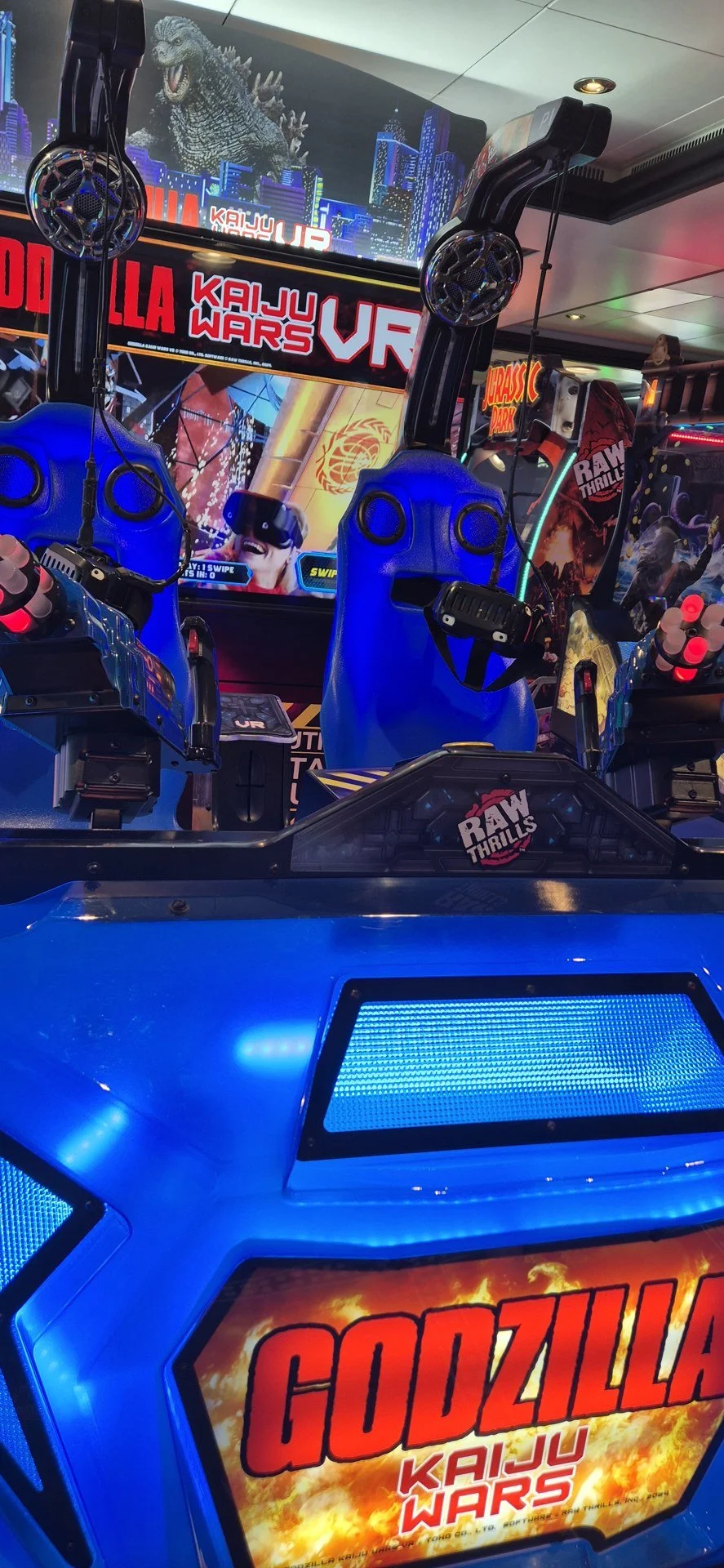 Colourful games in a cruise ship arcade.