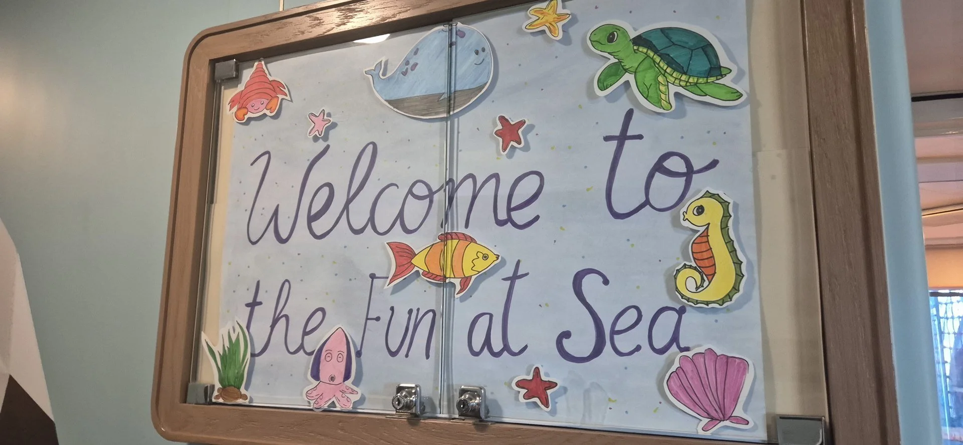 Welcome chalkboard displayed onboard.