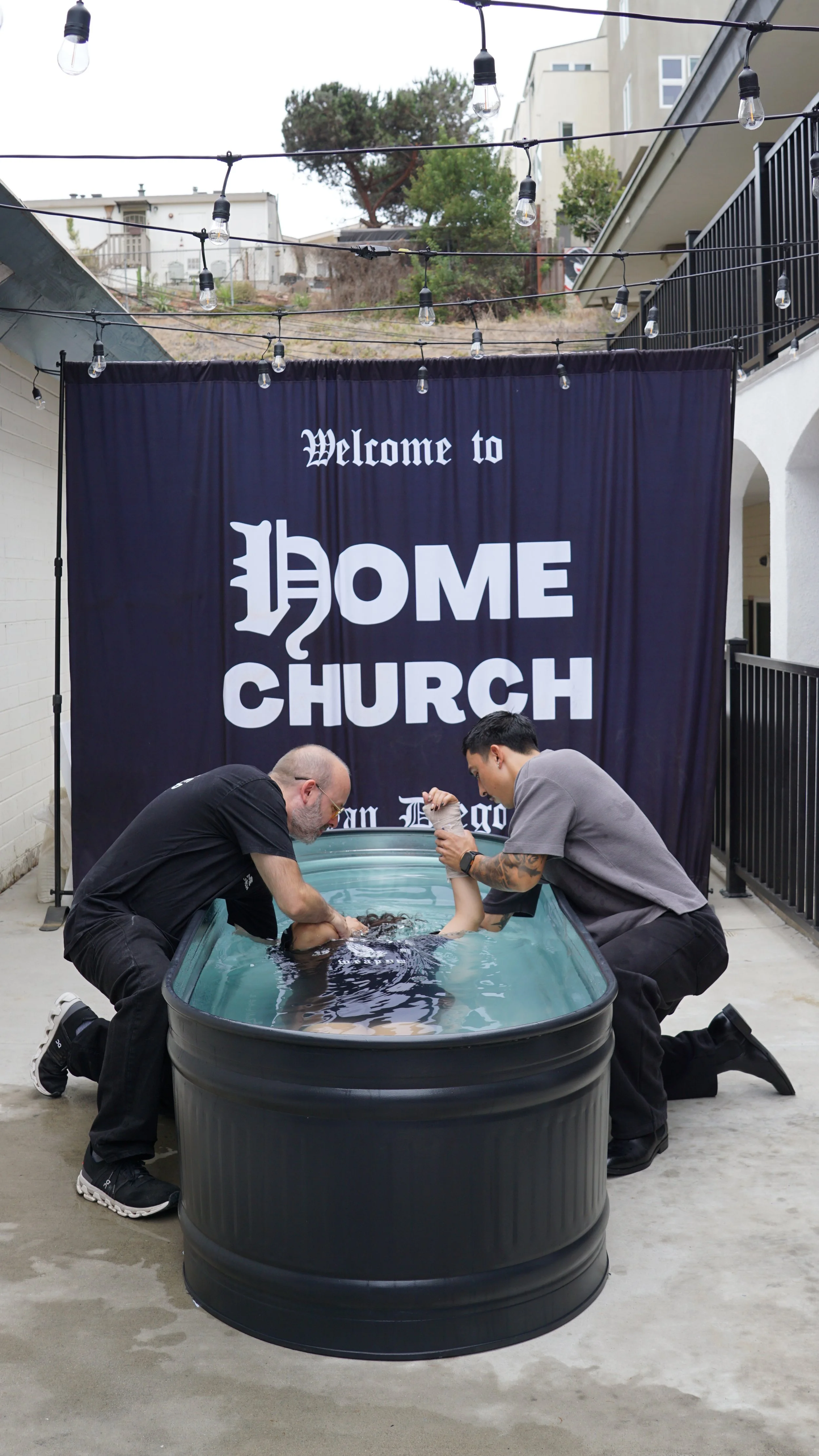 A baptism at Home Church during the September 27 gathering.