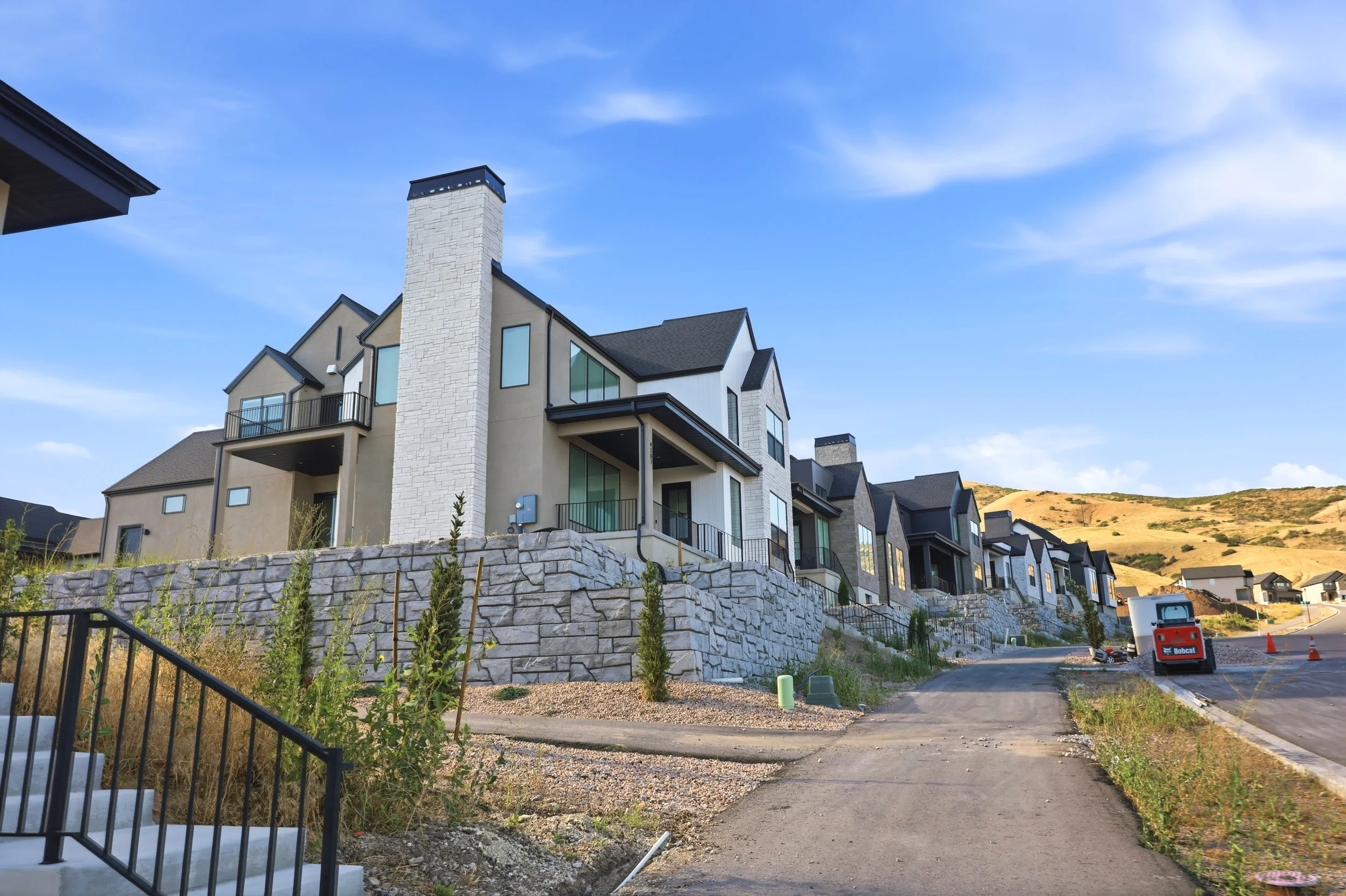Modern hillside homes and mountain scenery in Lehi, Utah