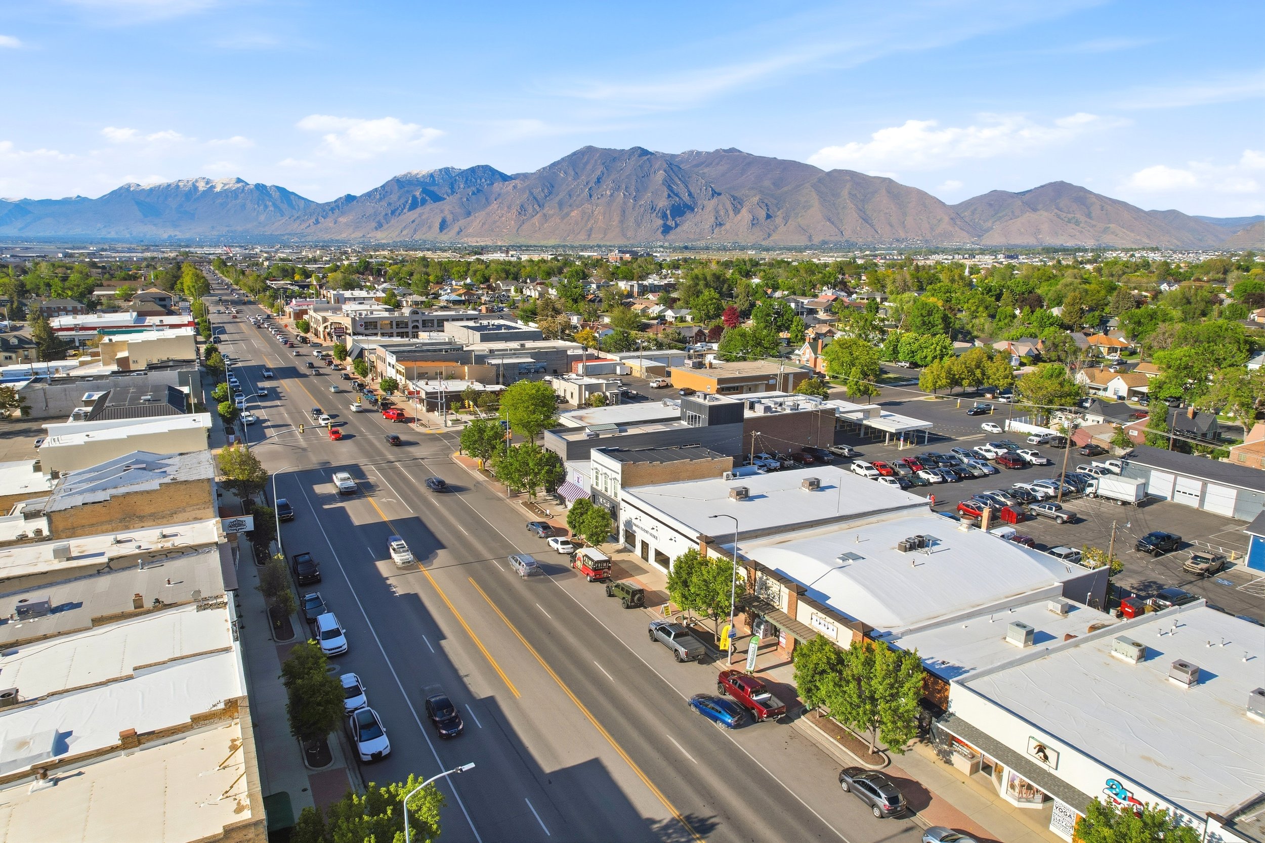 Aerial view of historic downtown Spanish Fork Utah with mountains beyond