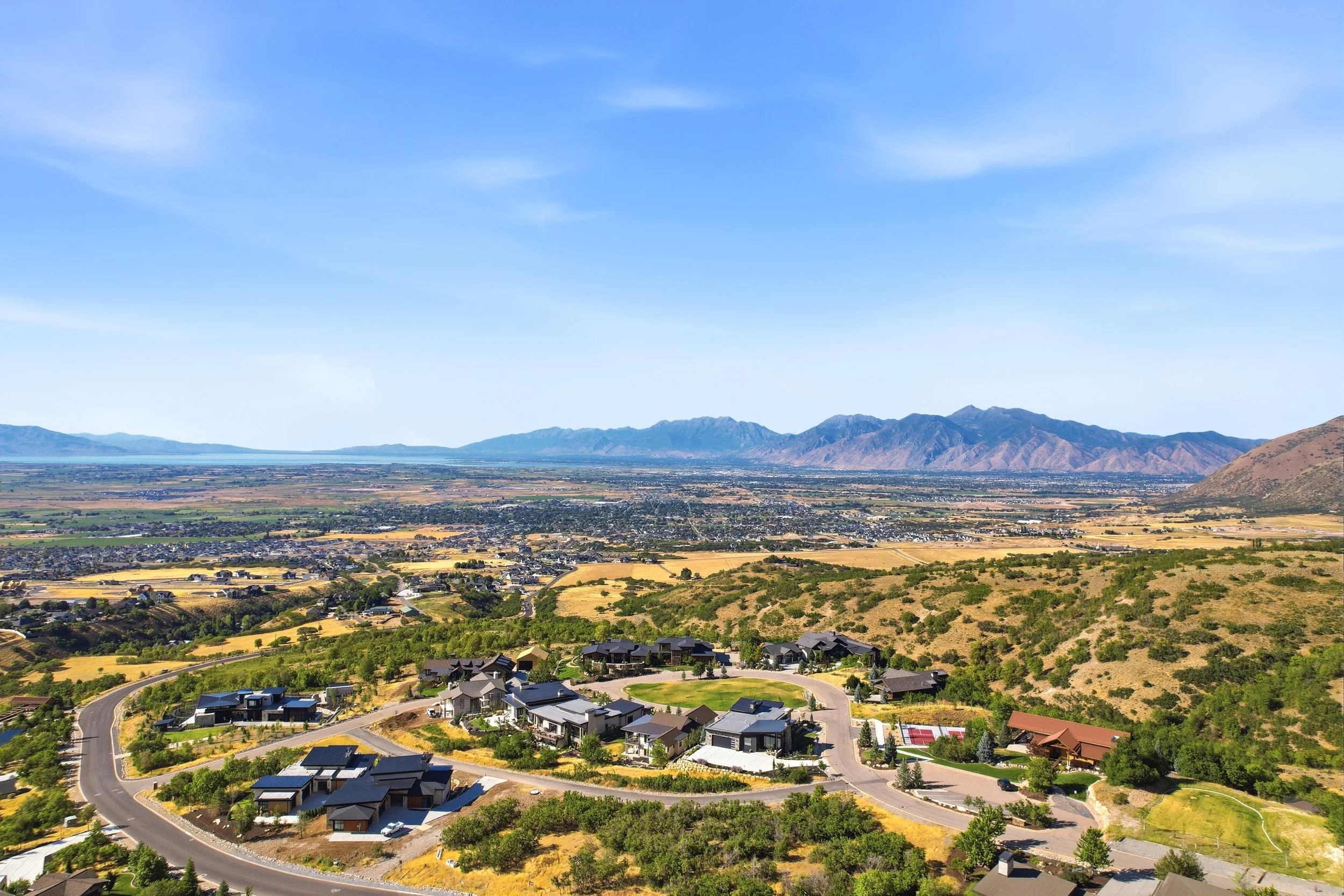 Aerial view of Woodland Hills Utah homes above southern Utah Valley