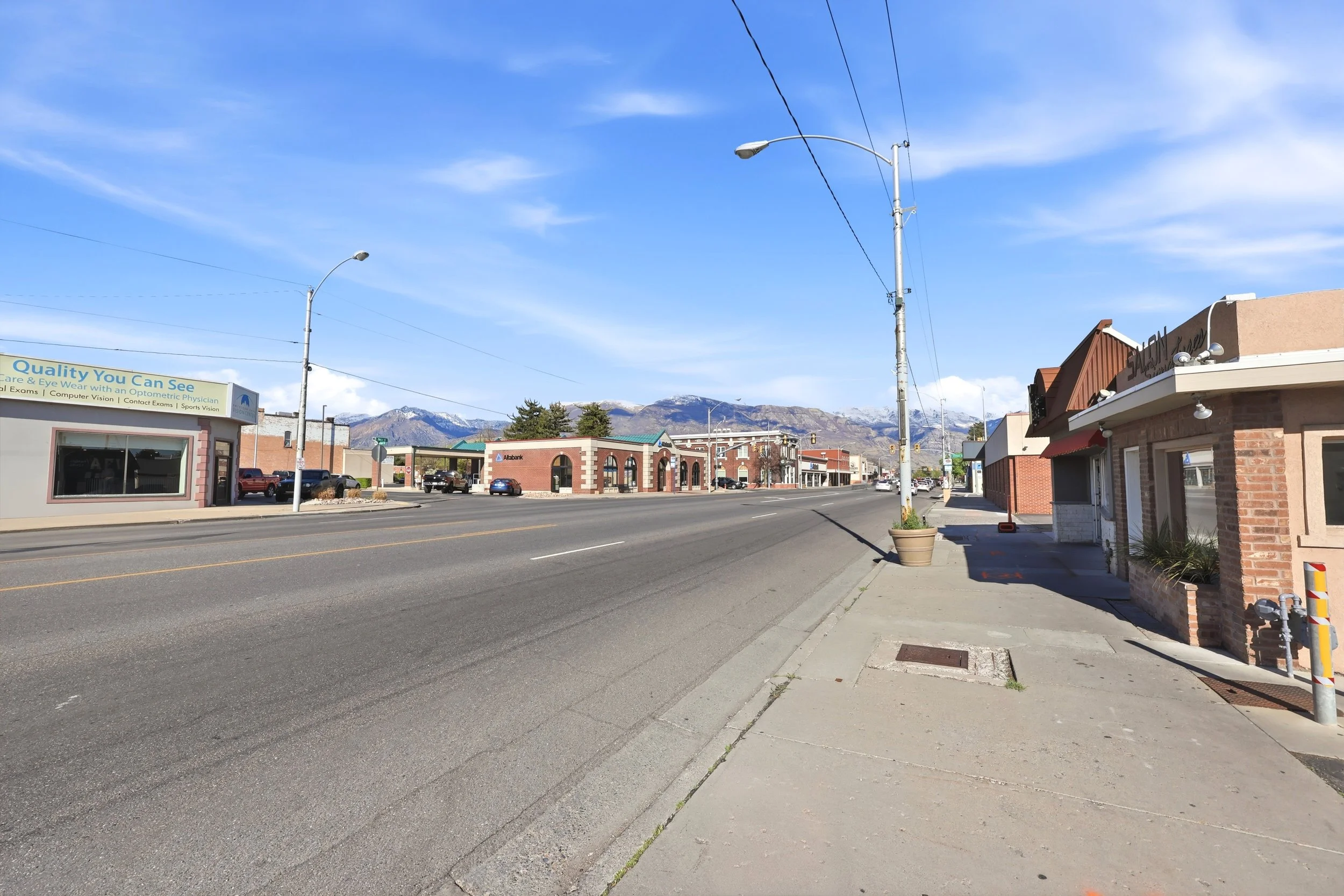 Historic Main Street in American Fork Utah with downtown buildings and mountains