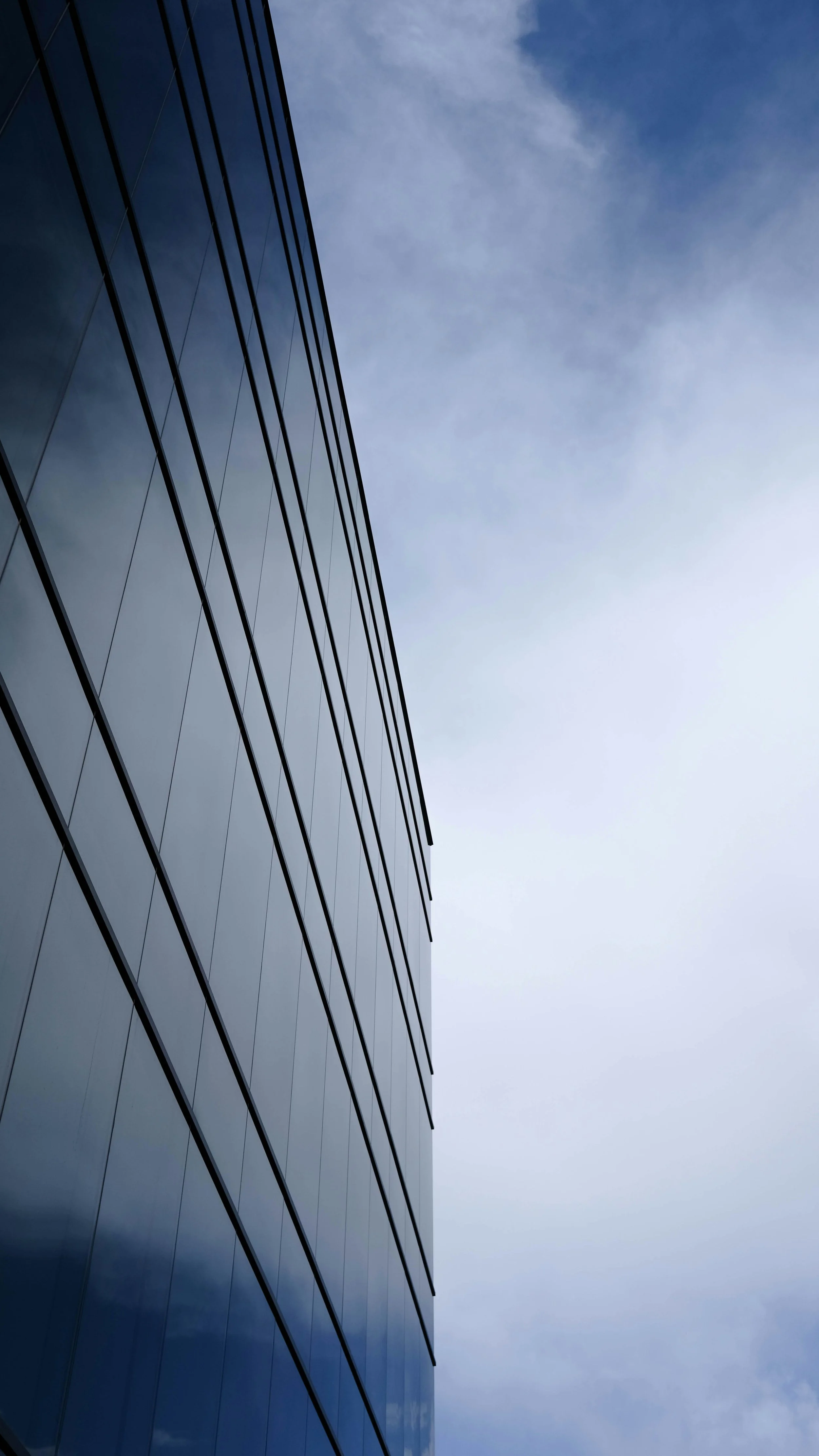 Modern glass office architecture representing the Silicon Slopes technology corridor in Lehi, Utah