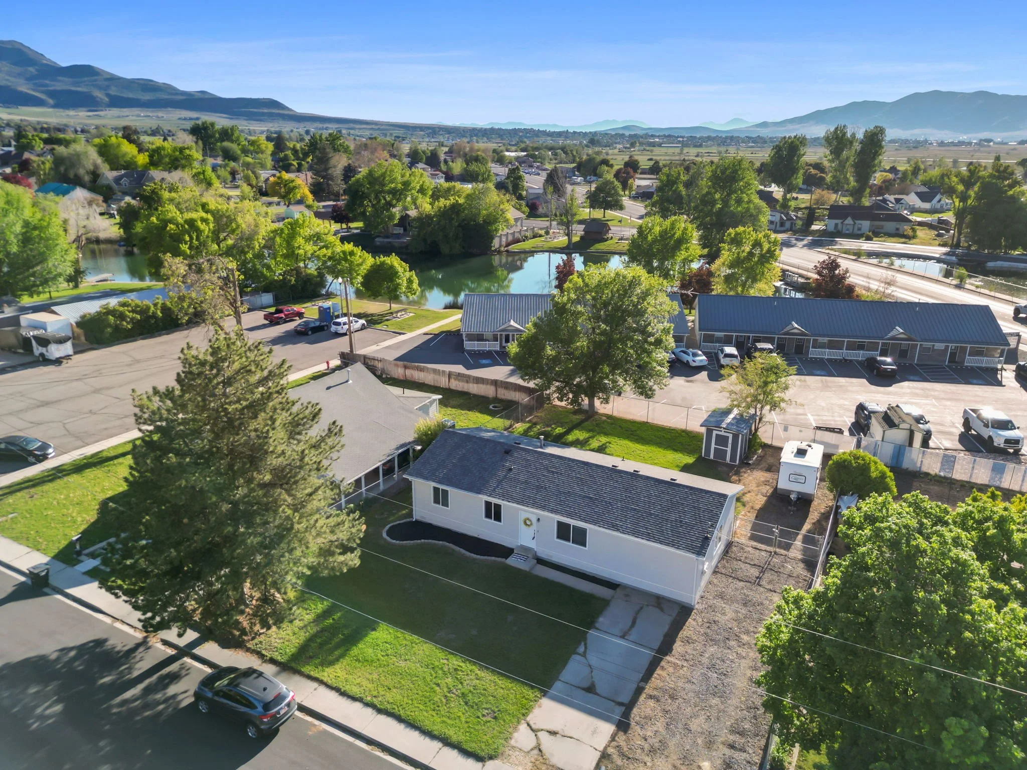 Aerial view of Salem Utah neighborhoods, community amenities, water and mountains