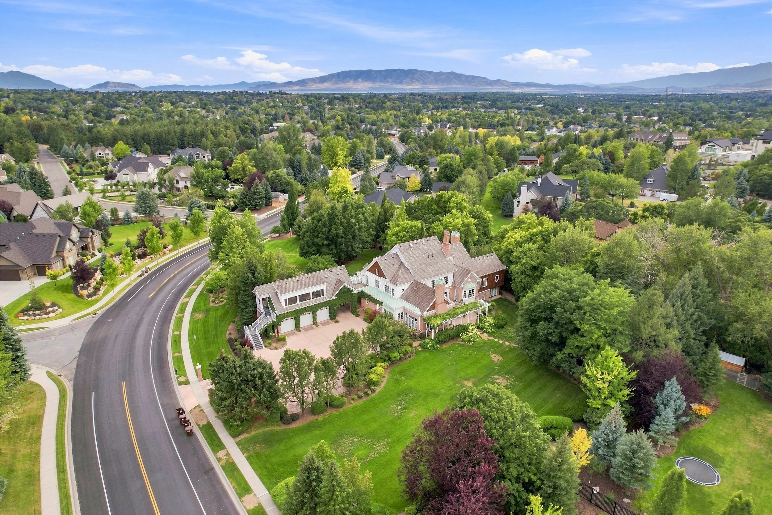 Established Alpine Utah neighborhood with mature landscaping and mountain views
